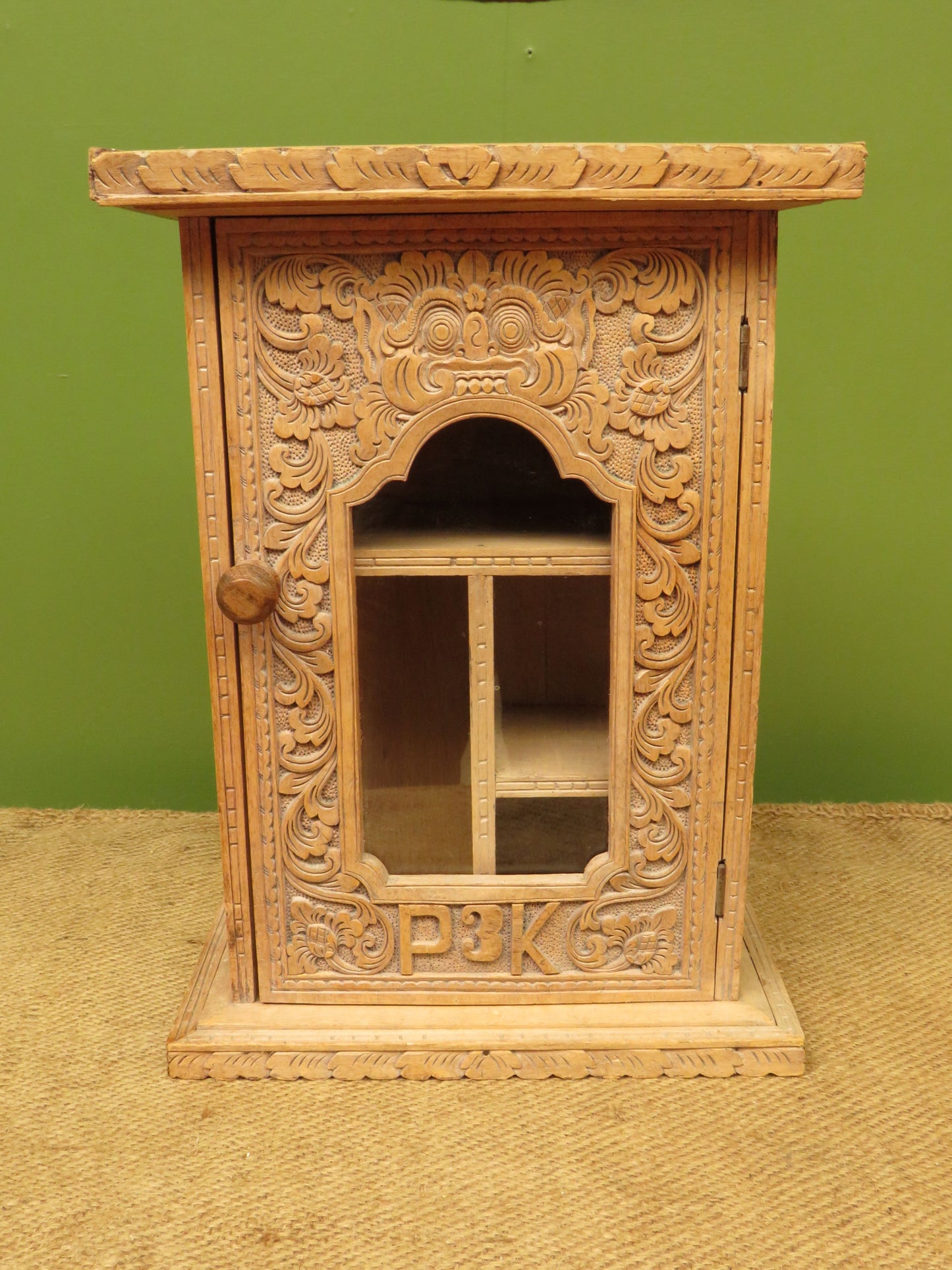 Ornate Small Indonesian Cabinet with glazed door