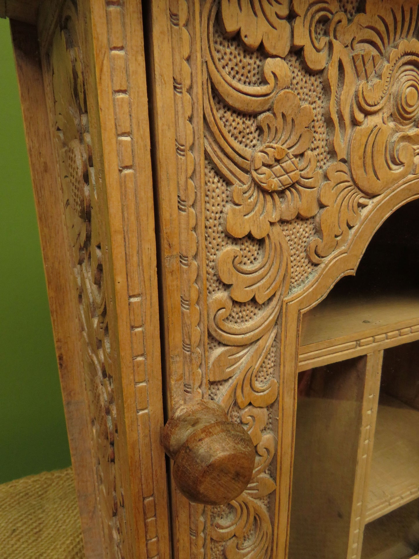 Ornate Small Indonesian Cabinet with glazed door