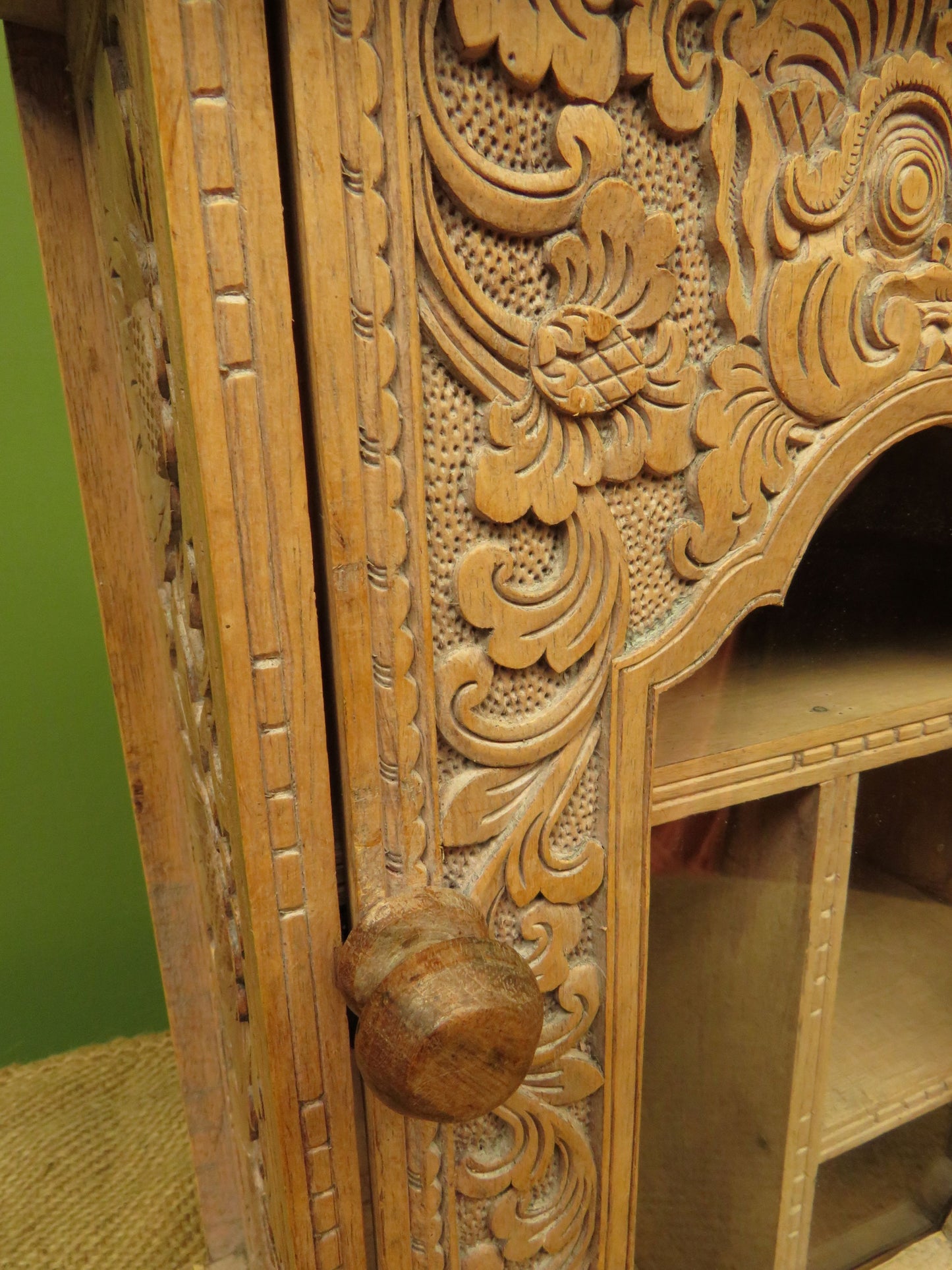 Ornate Small Indonesian Cabinet with glazed door