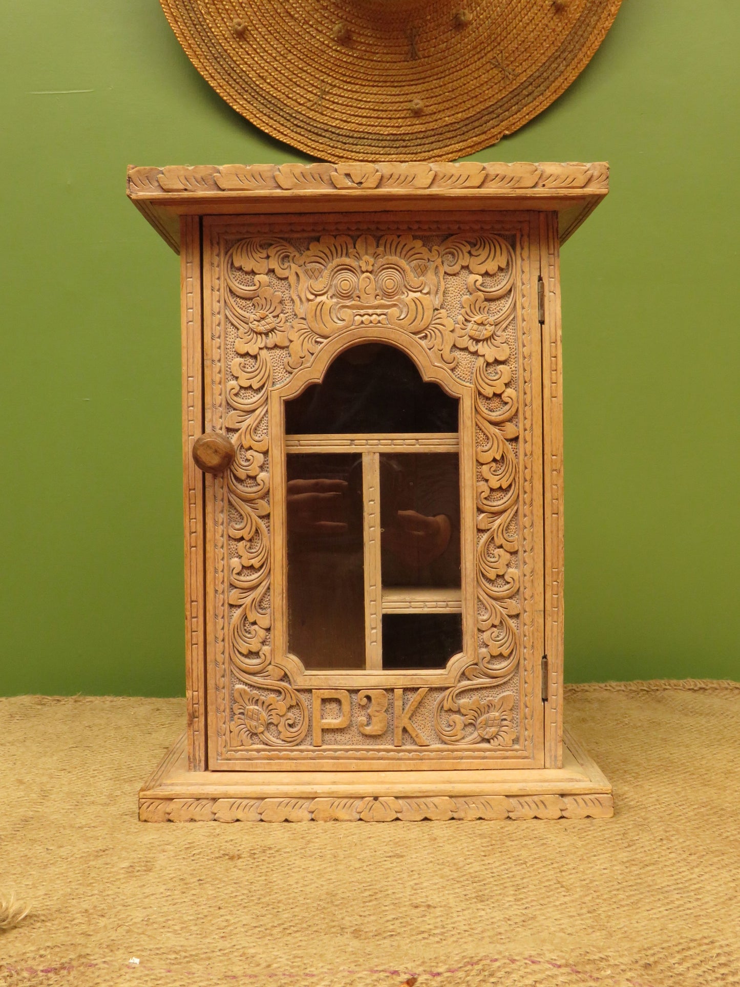 Ornate Small Indonesian Cabinet with glazed door
