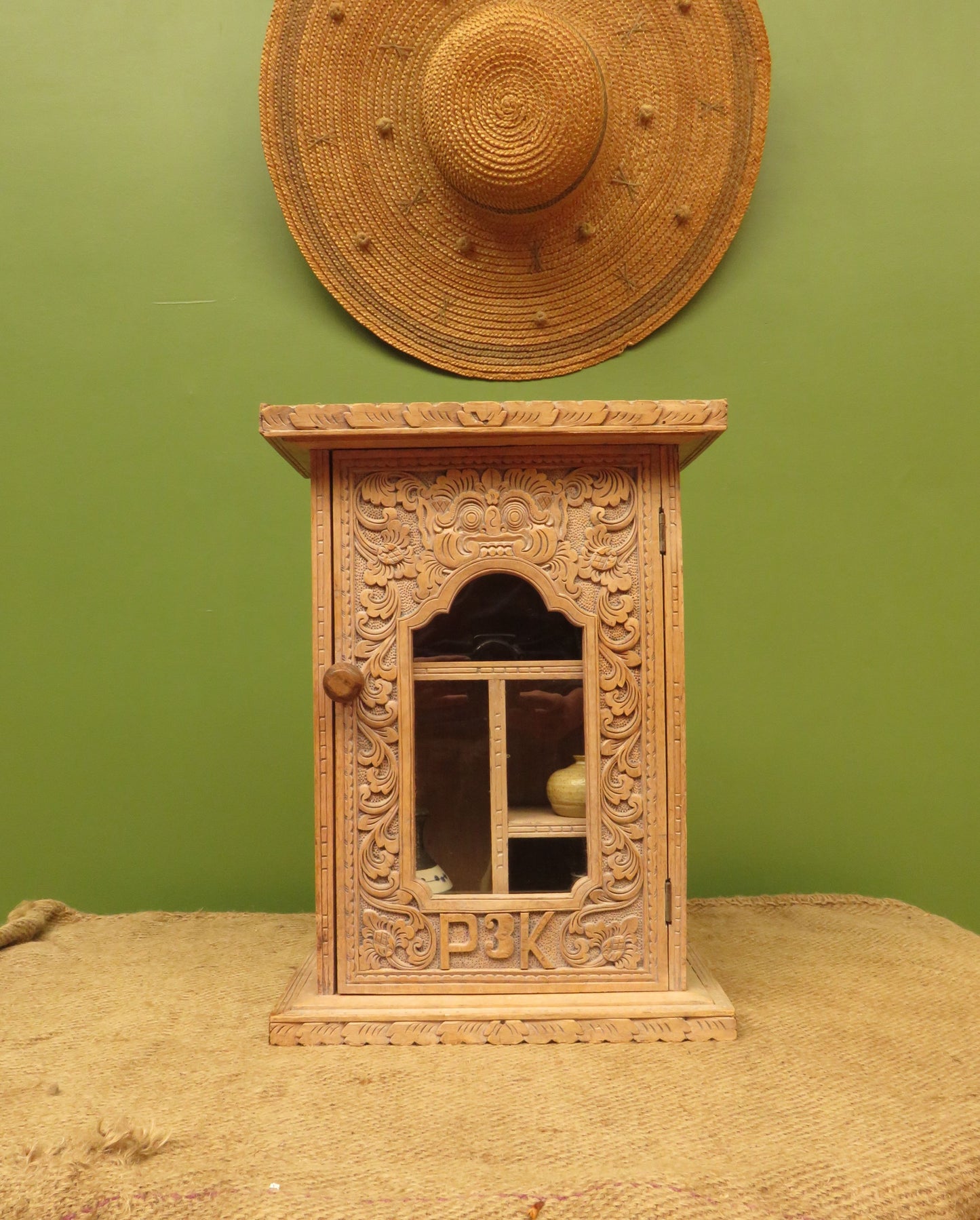 Ornate Small Indonesian Cabinet with glazed door