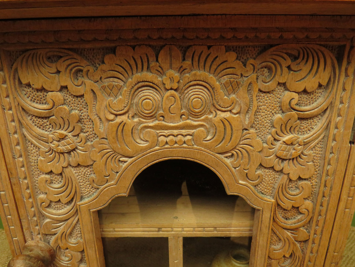 Ornate Small Indonesian Cabinet with glazed door