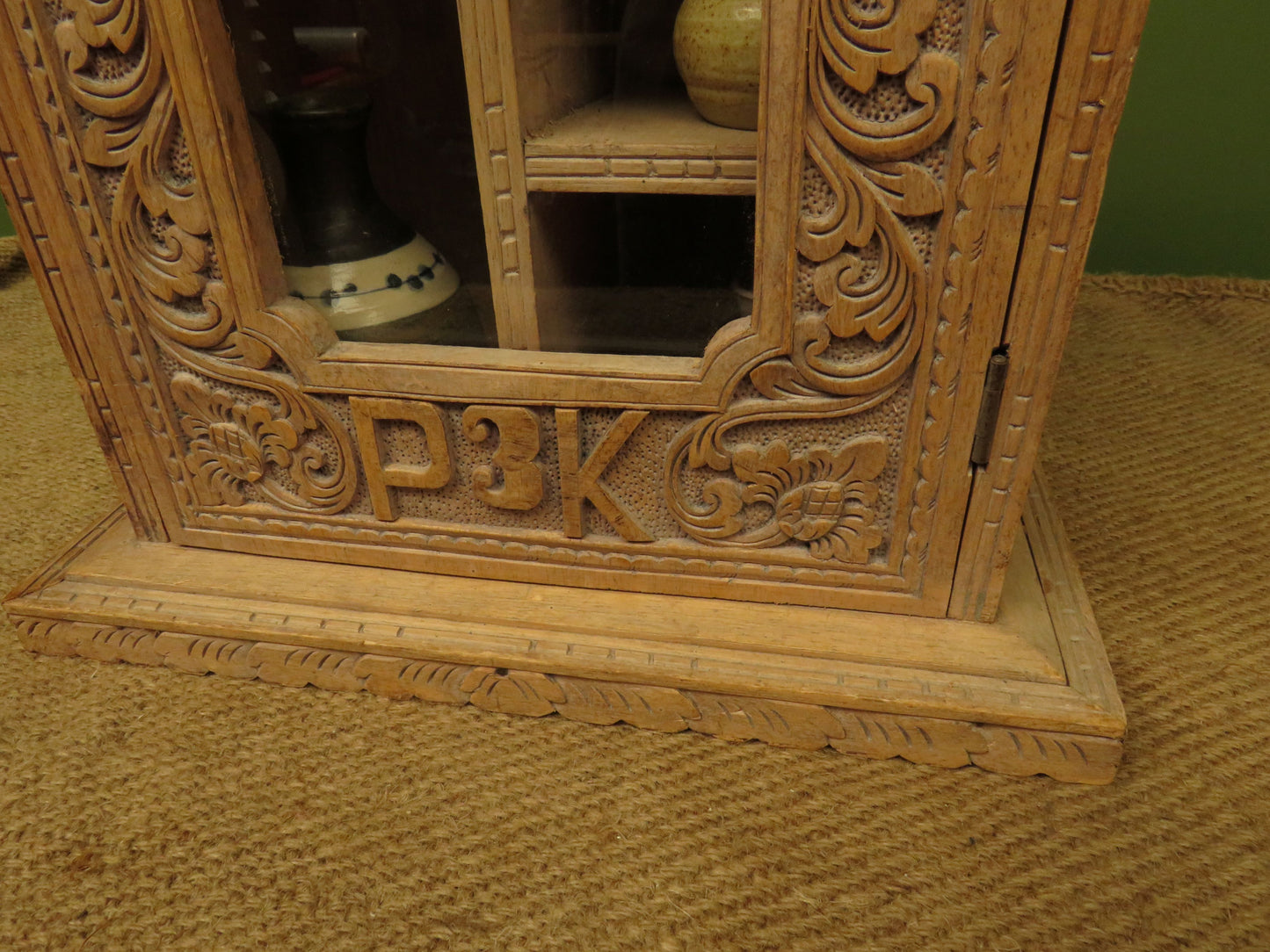 Ornate Small Indonesian Cabinet with glazed door