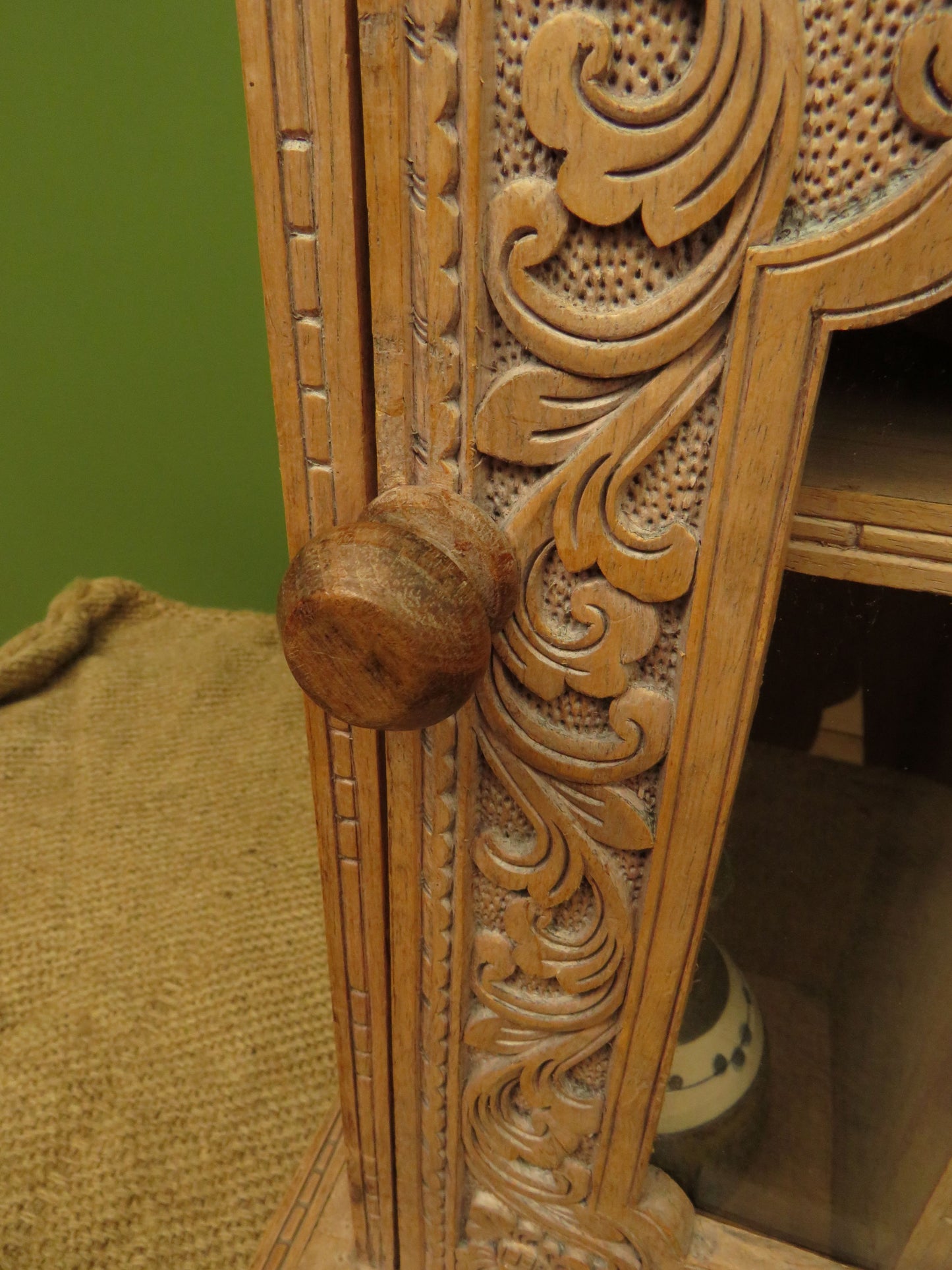 Ornate Small Indonesian Cabinet with glazed door