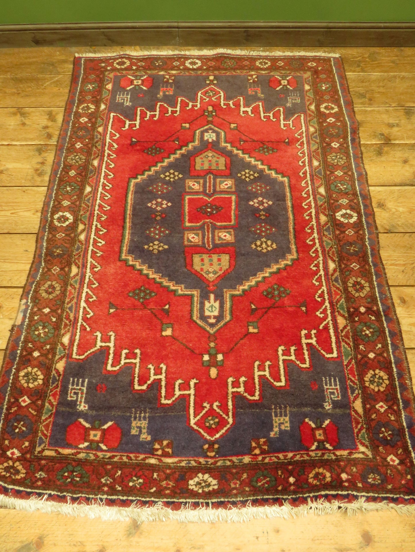 Vintage Traditional Turkish Rug in reds and blues