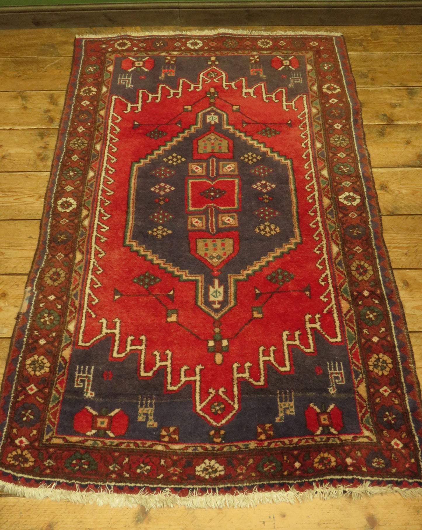 Vintage Traditional Turkish Rug in reds and blues