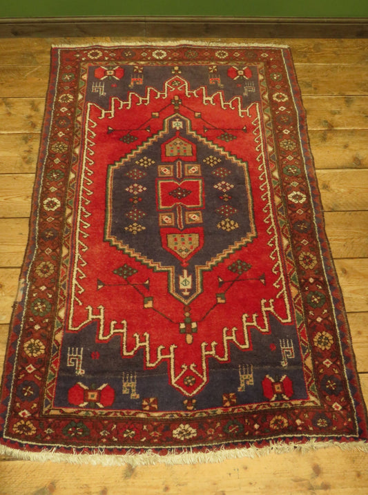 Vintage Traditional Turkish Rug in reds and blues