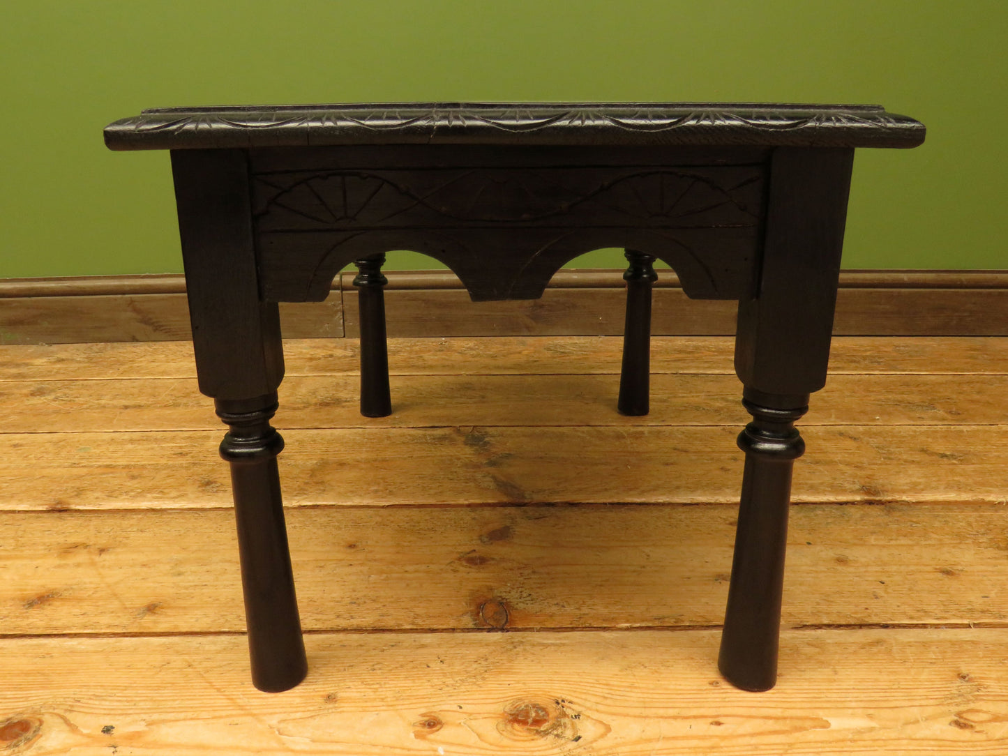 Small ebonised black table