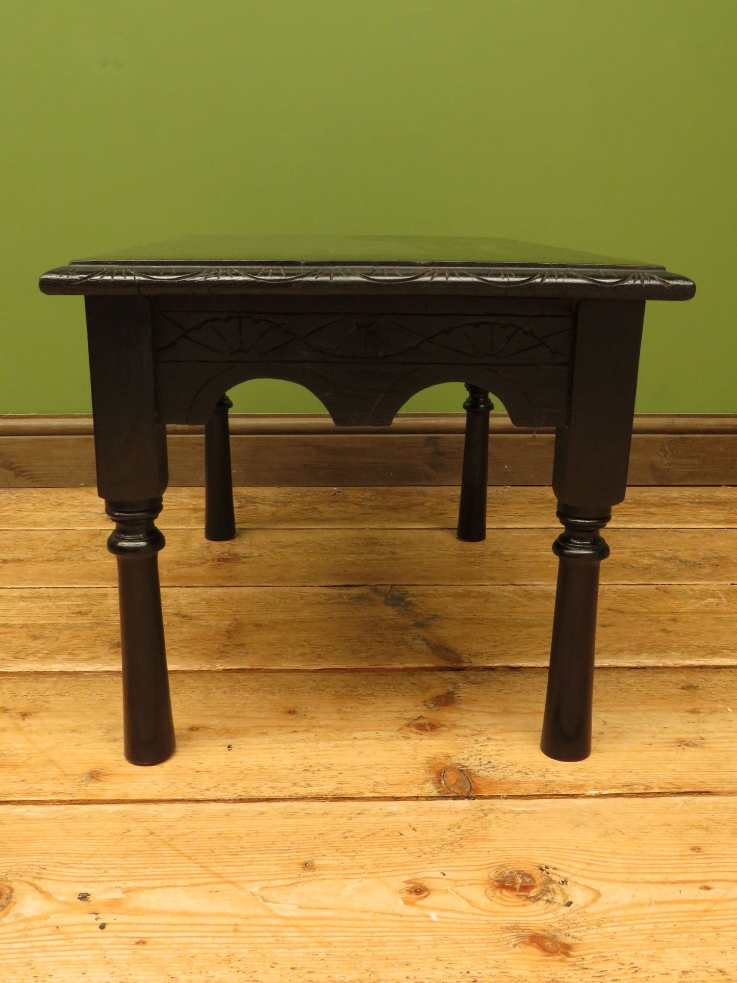 Small ebonised black table