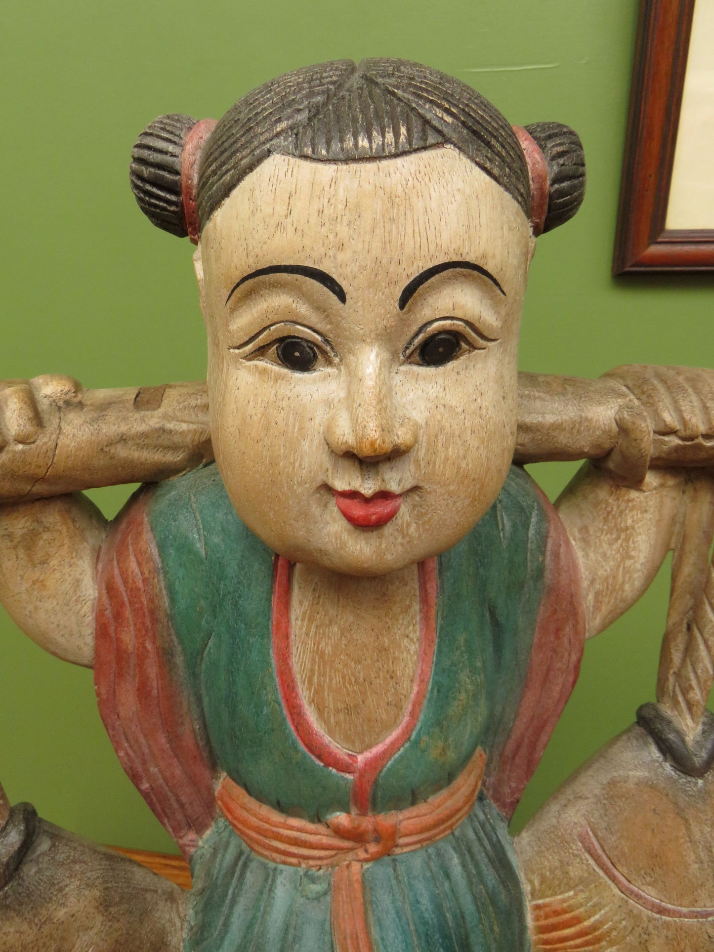 Vintage Asian wooden figure carrying fish