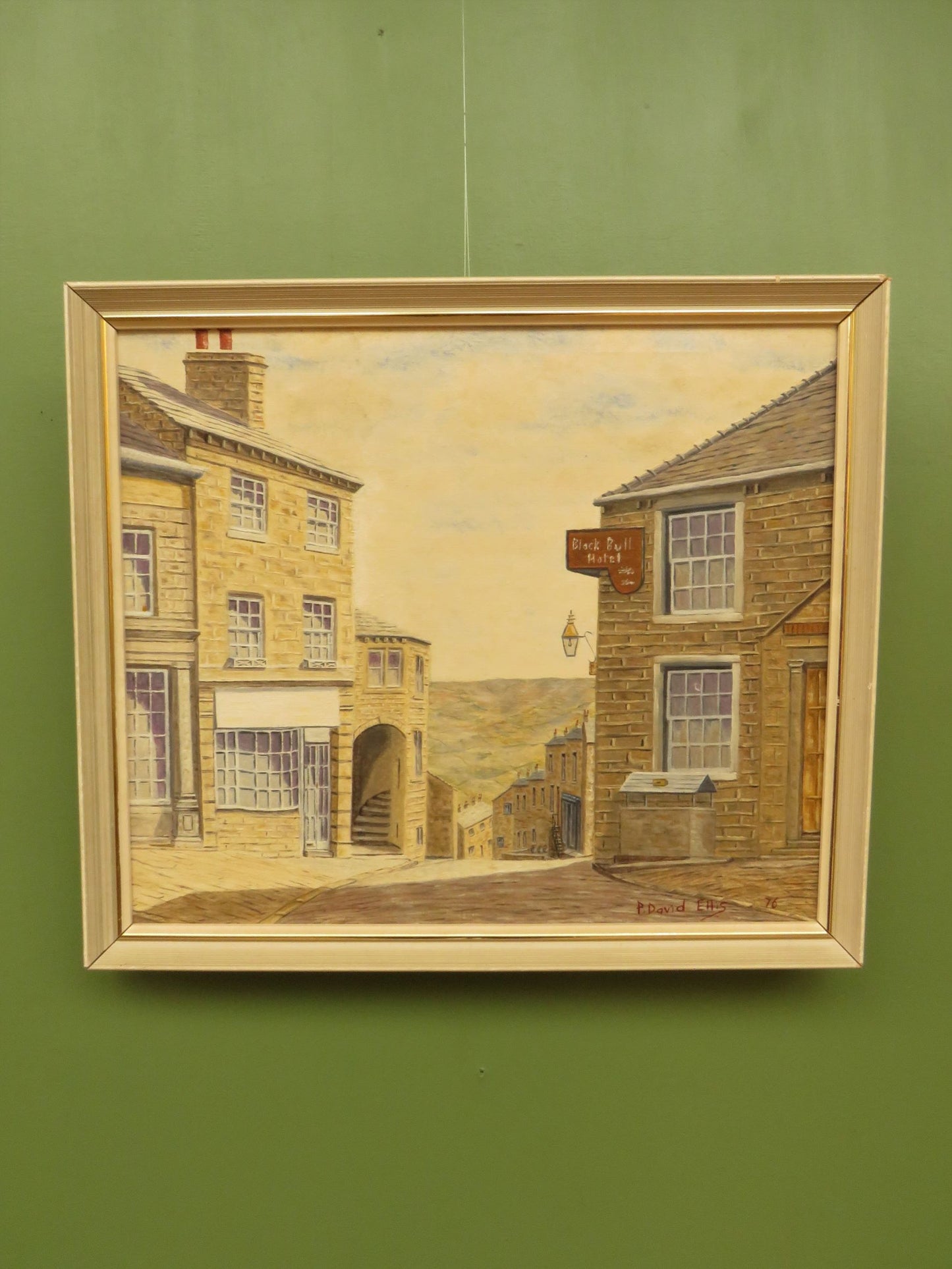 Framed oil painting of The Black Bull Hotel in Haworth by David Ellis, 1976