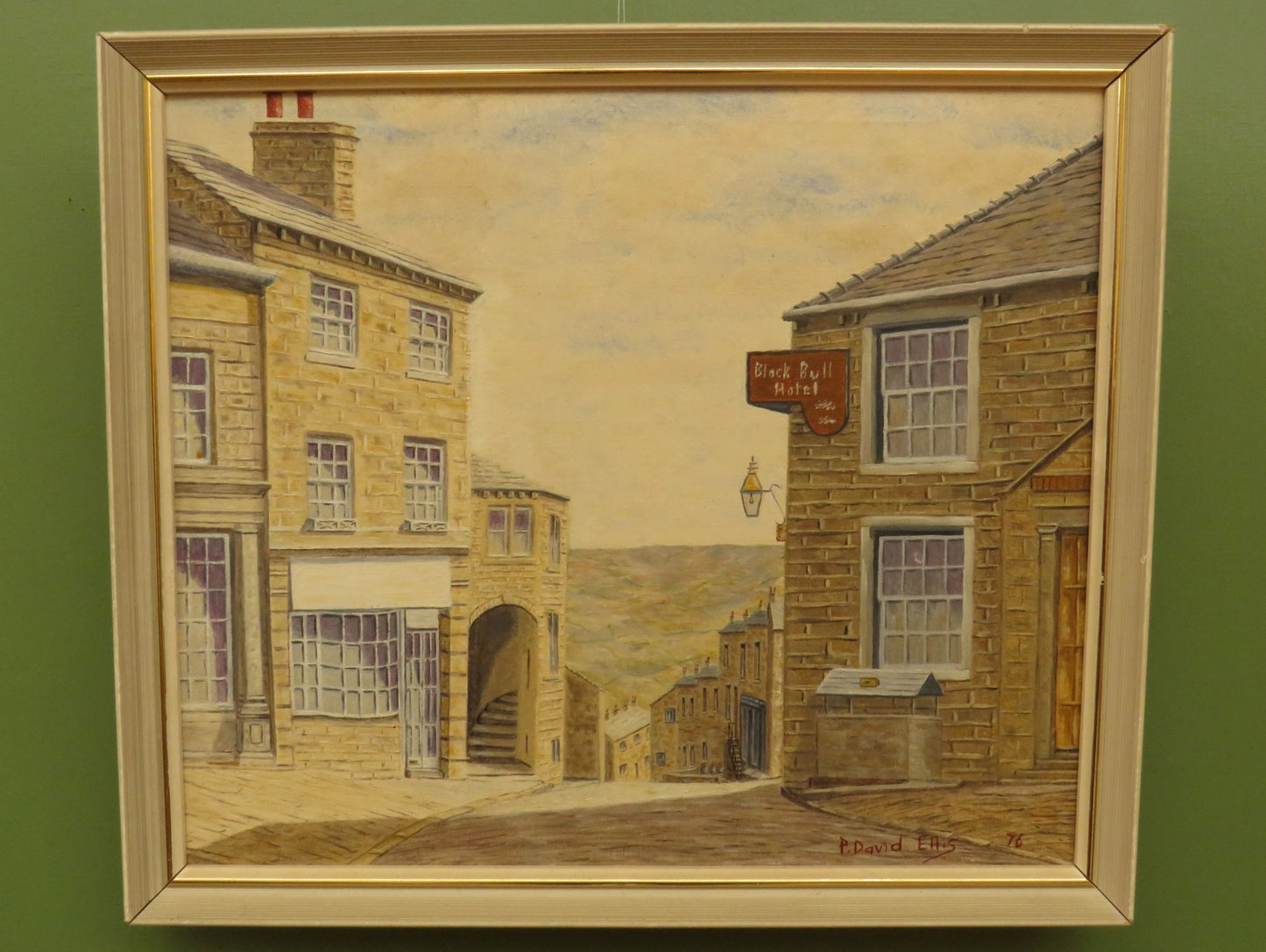 Framed oil painting of The Black Bull Hotel in Haworth by David Ellis, 1976