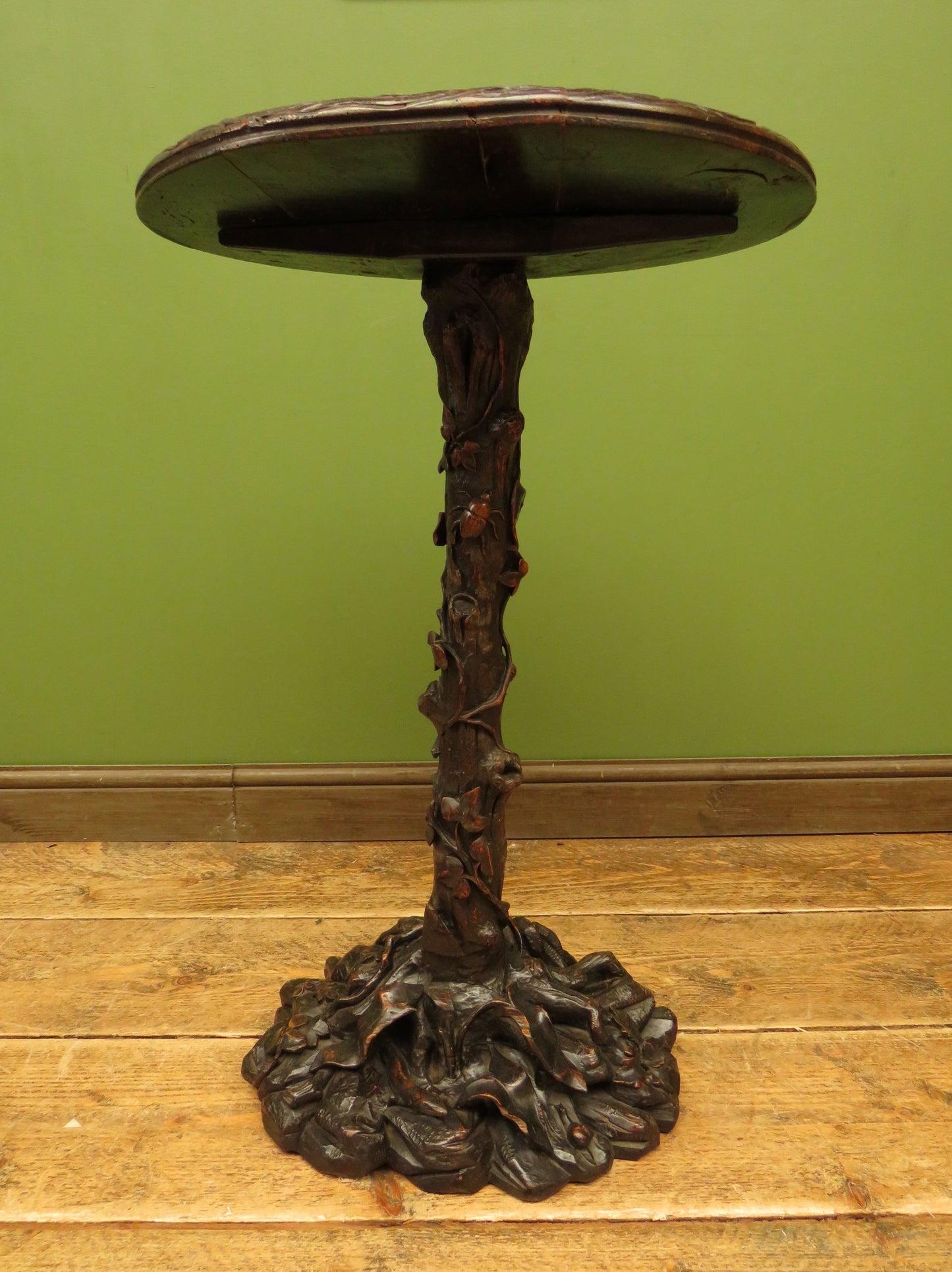 Carved Antique Black Forest Table in the style of Matthew & Willem Horrix