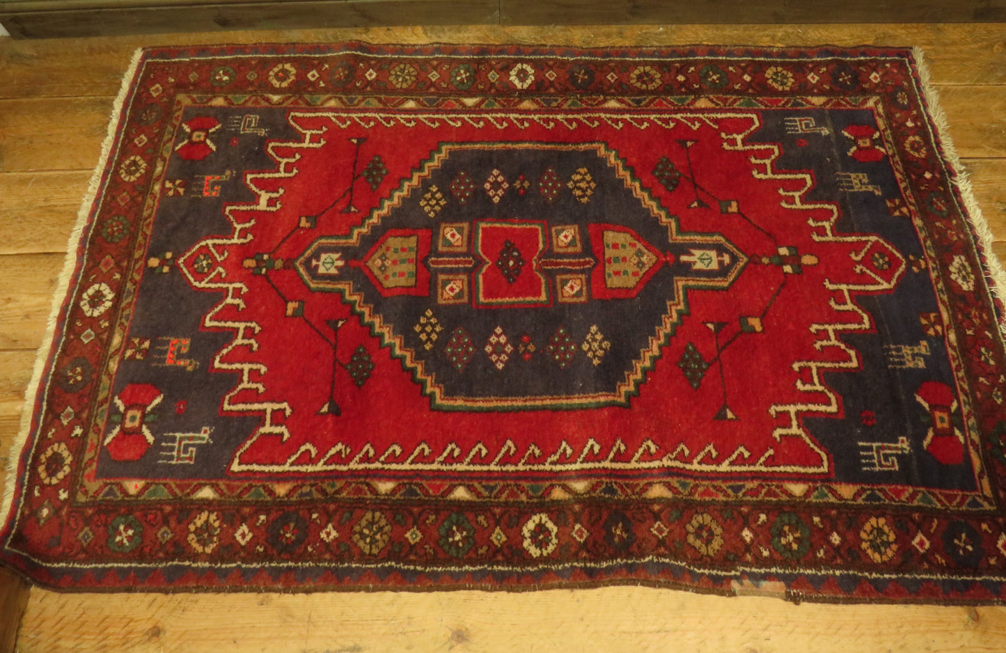 Vintage Traditional Turkish Rug in reds and blues