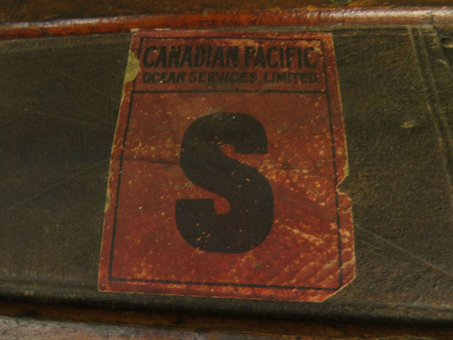 Large Antique Dome Top Travelling trunk with old Canadian luggage labels