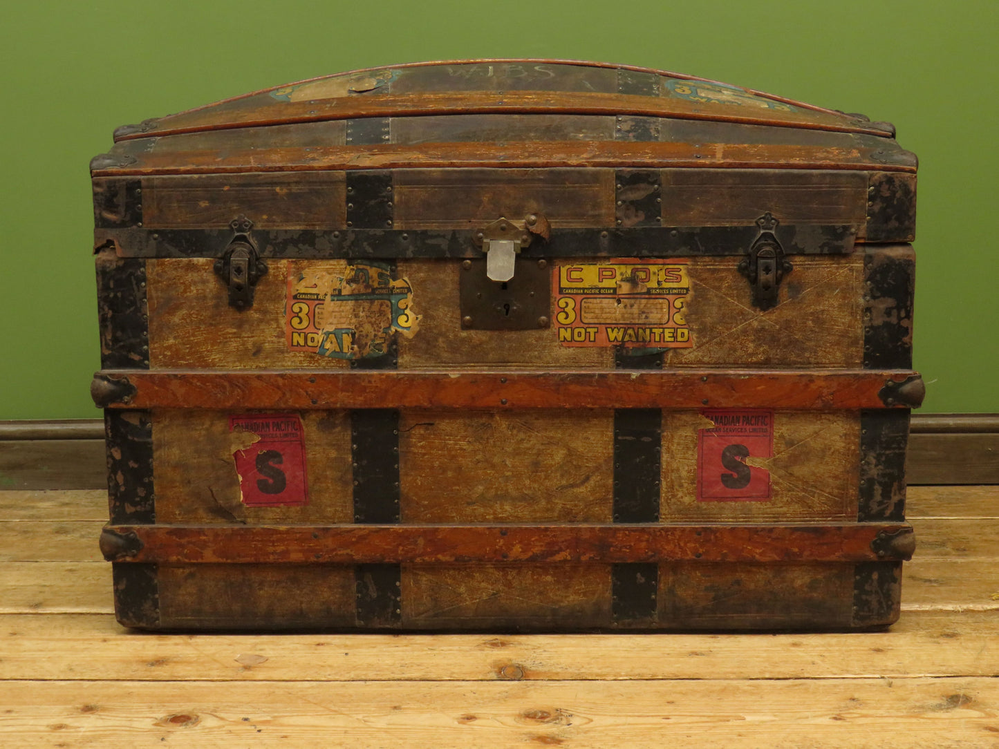 Large Antique Dome Top Travelling trunk with old Canadian luggage labels