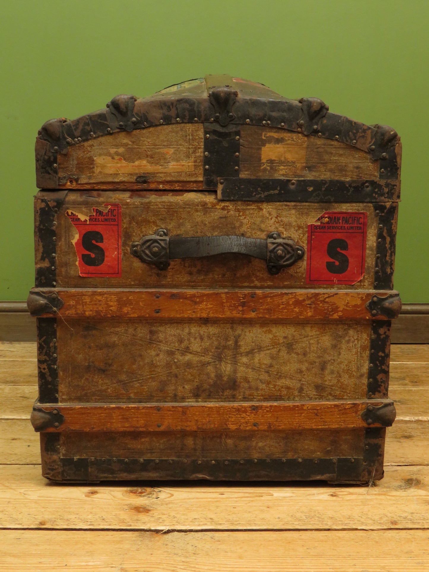 Large Antique Dome Top Travelling trunk with old Canadian luggage labels