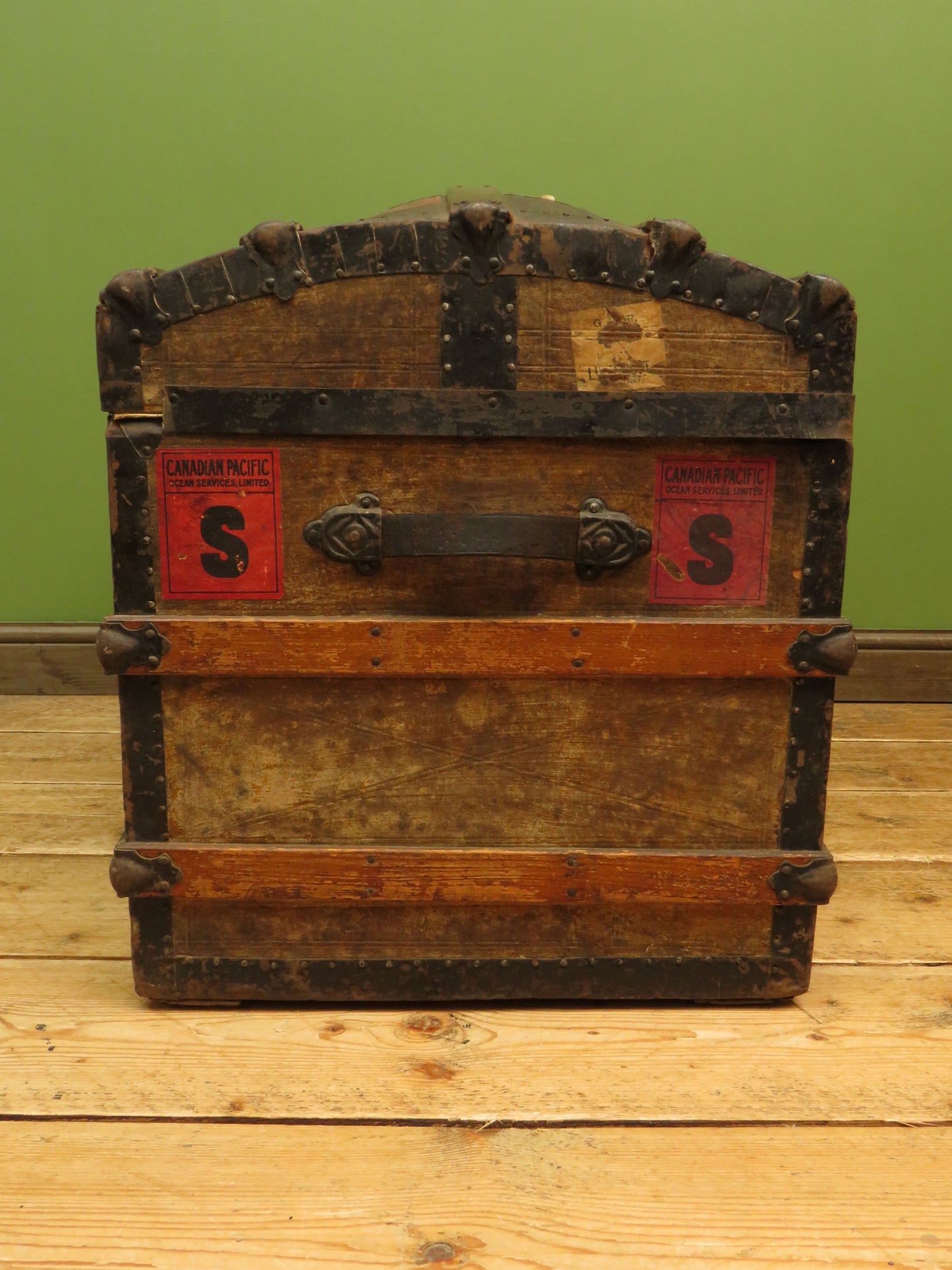 Large Antique Dome Top Travelling trunk with old Canadian luggage labels