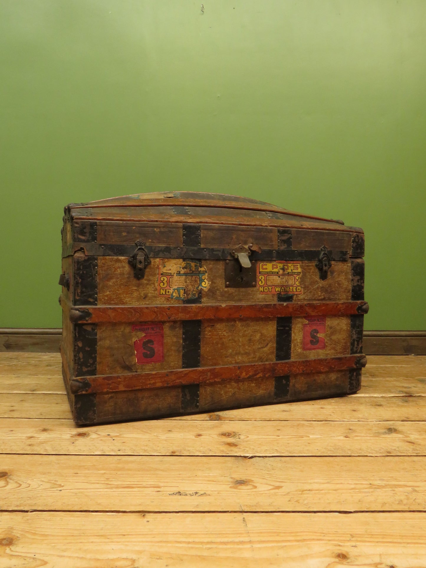 Large Antique Dome Top Travelling trunk with old Canadian luggage labels