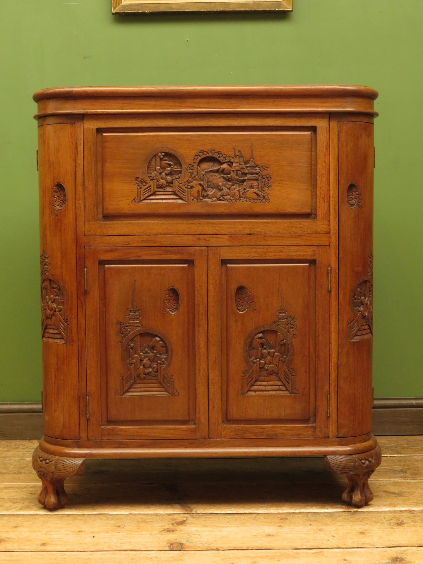 Oriental Hardwood Cocktail Cabinet with Bow Front & Carvings