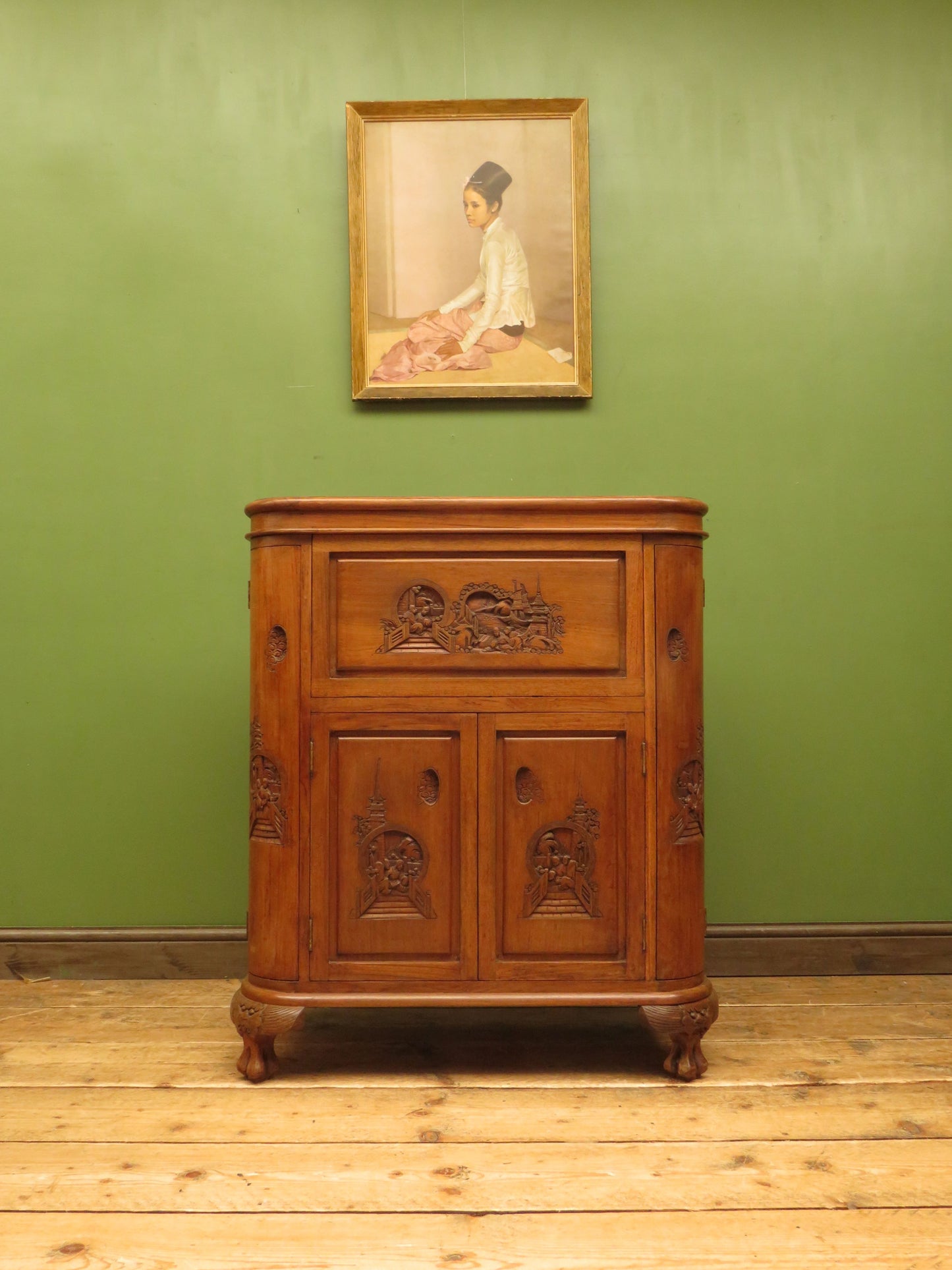 Oriental Hardwood Cocktail Cabinet with Bow Front & Carvings