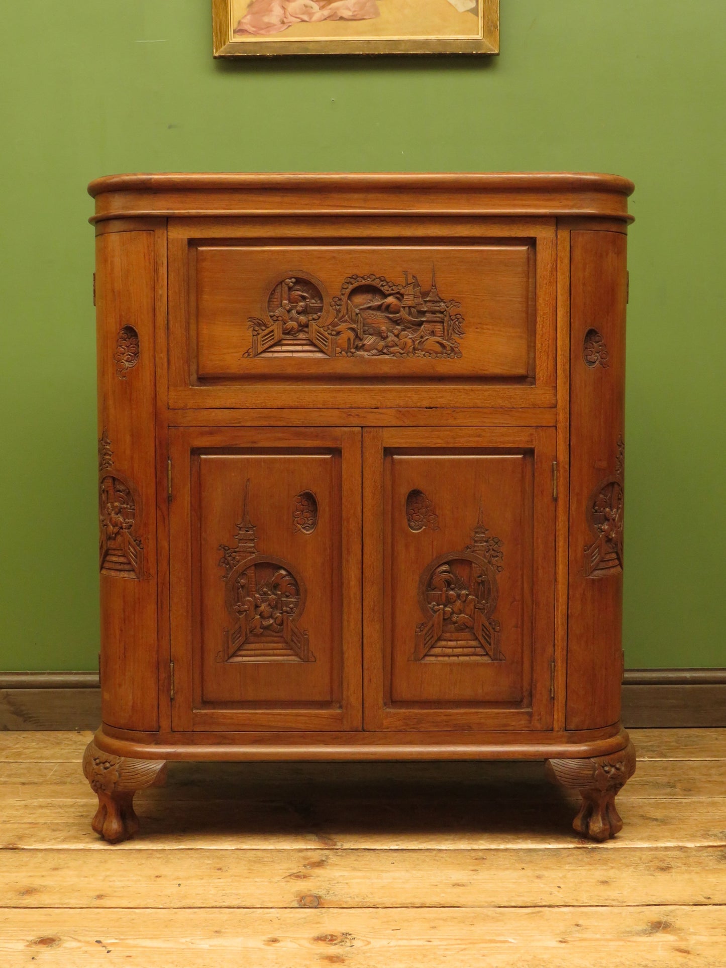 Oriental Hardwood Cocktail Cabinet with Bow Front & Carvings