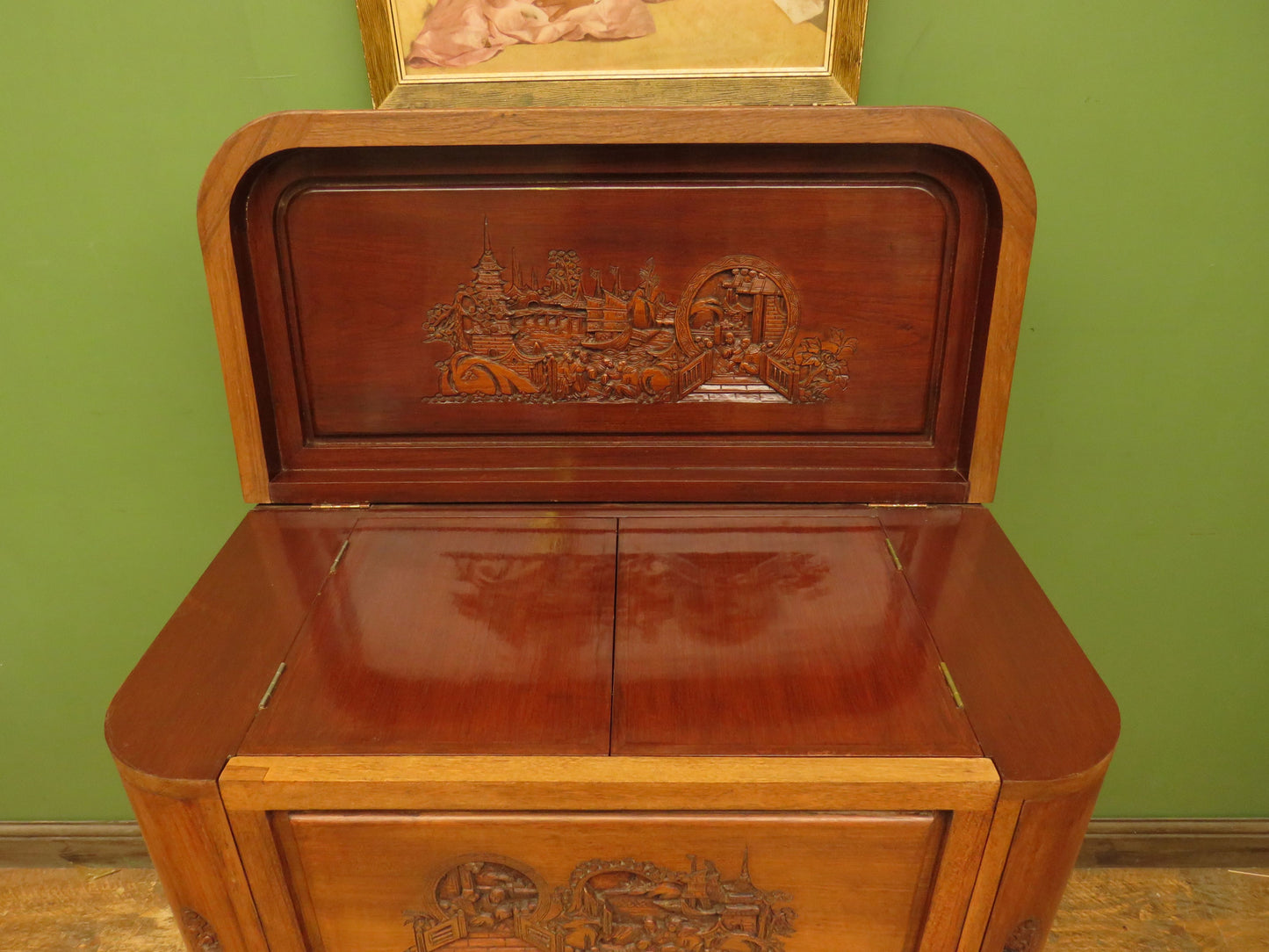 Oriental Hardwood Cocktail Cabinet with Bow Front & Carvings