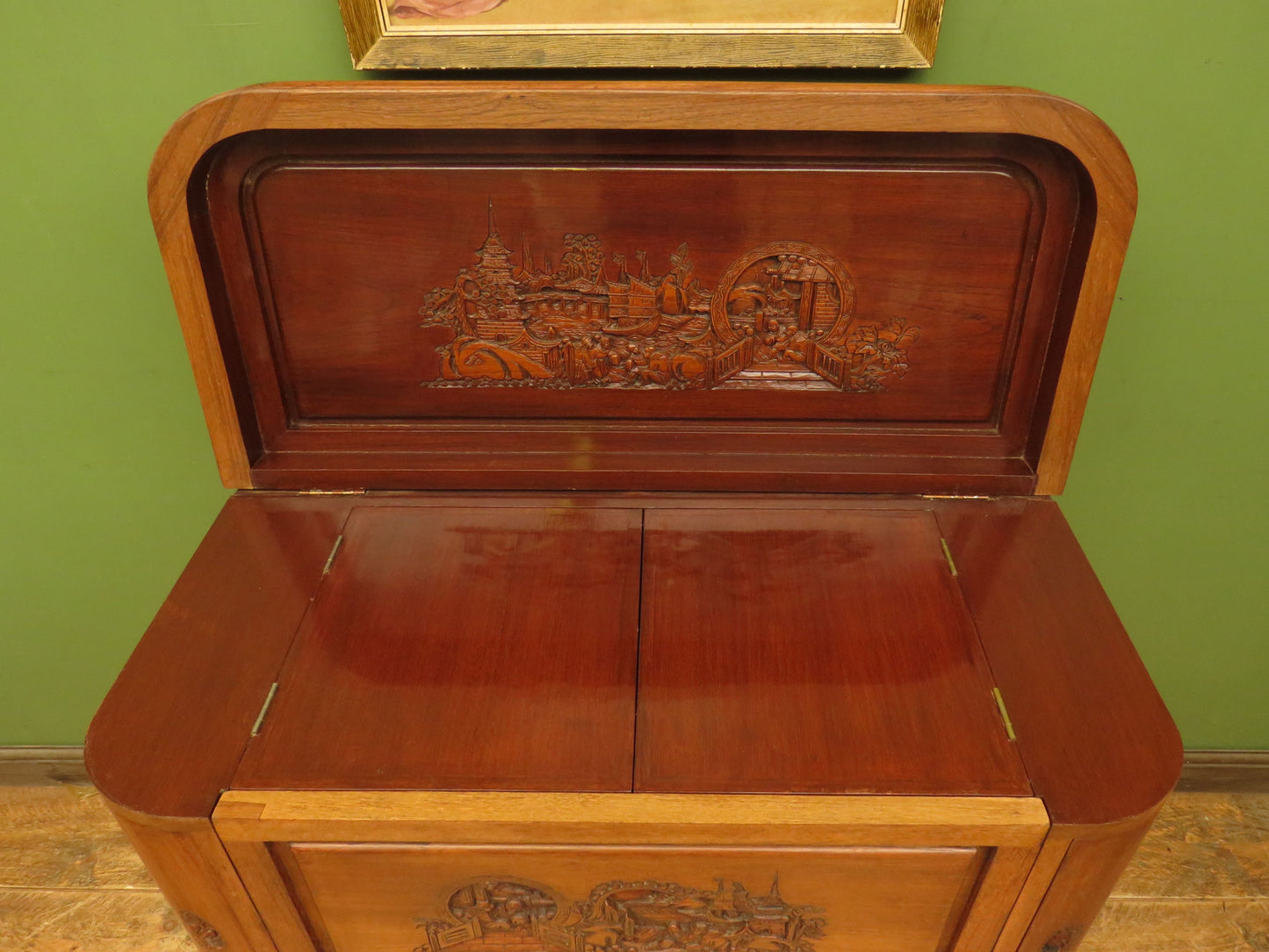 Oriental Hardwood Cocktail Cabinet with Bow Front & Carvings