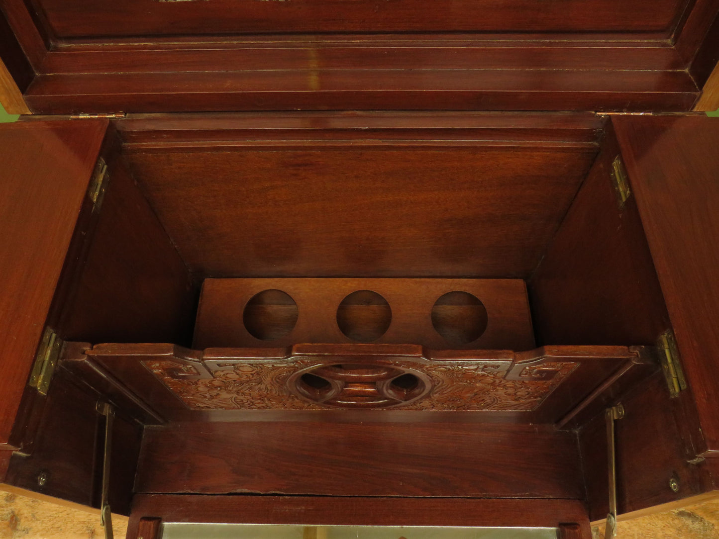 Oriental Hardwood Cocktail Cabinet with Bow Front & Carvings