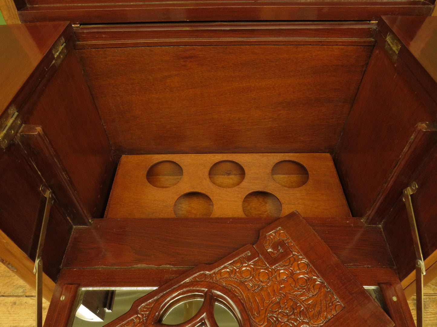 Oriental Hardwood Cocktail Cabinet with Bow Front & Carvings