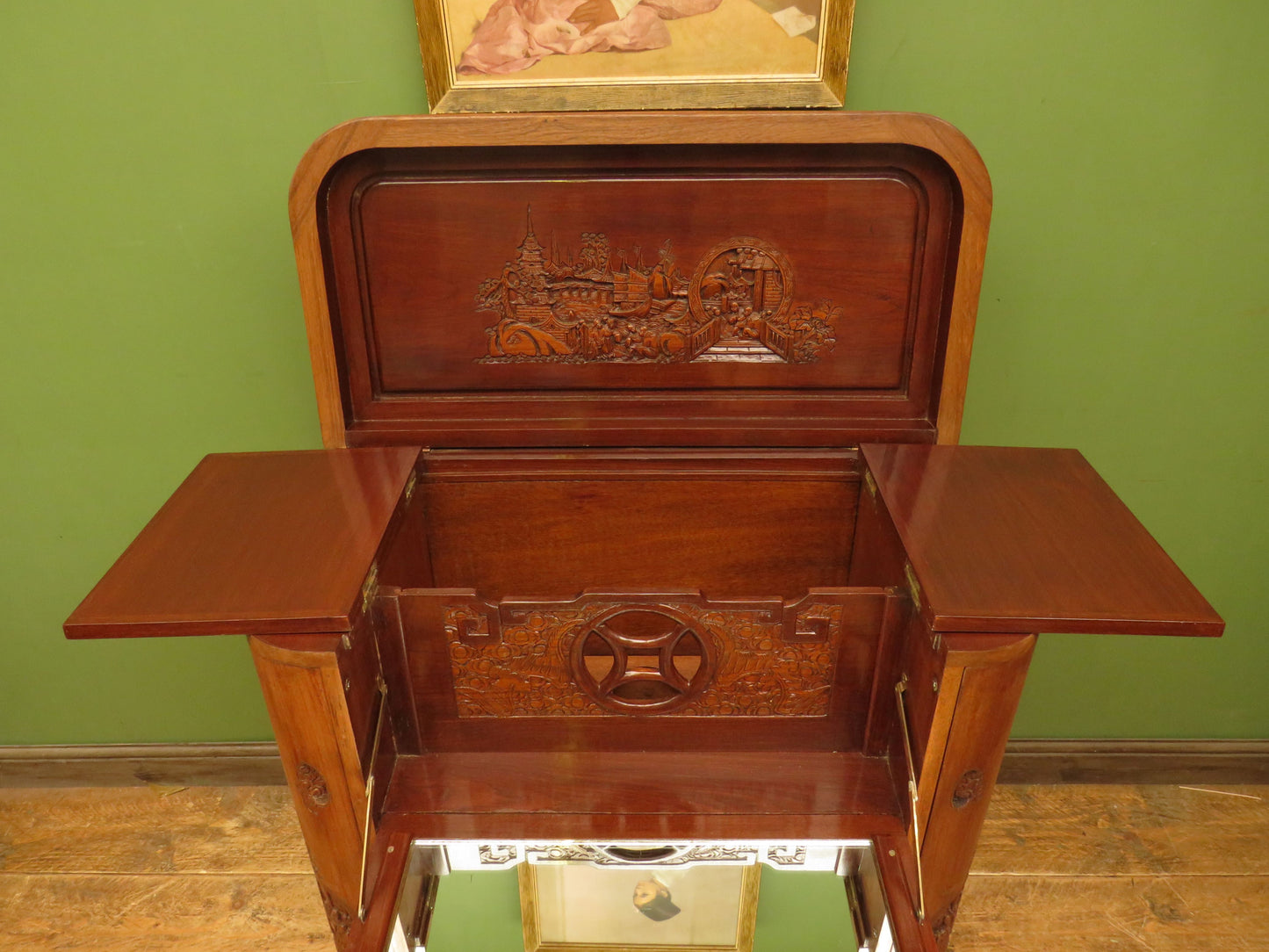 Oriental Hardwood Cocktail Cabinet with Bow Front & Carvings