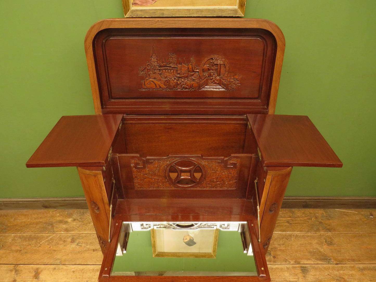 Oriental Hardwood Cocktail Cabinet with Bow Front & Carvings