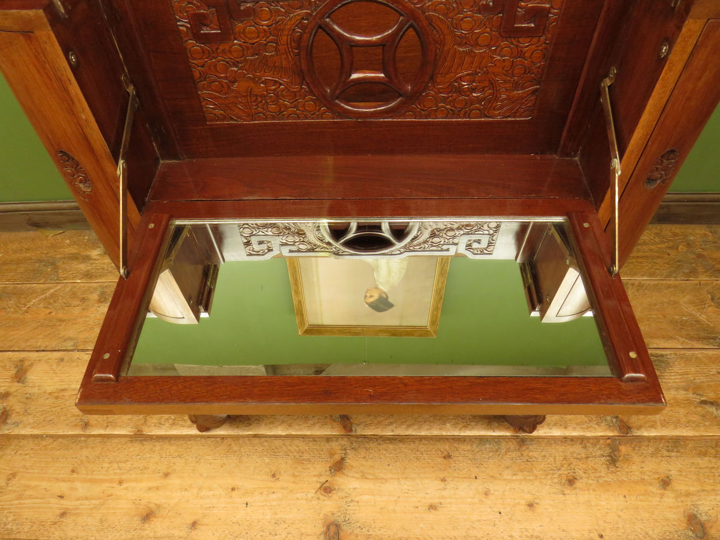 Oriental Hardwood Cocktail Cabinet with Bow Front & Carvings