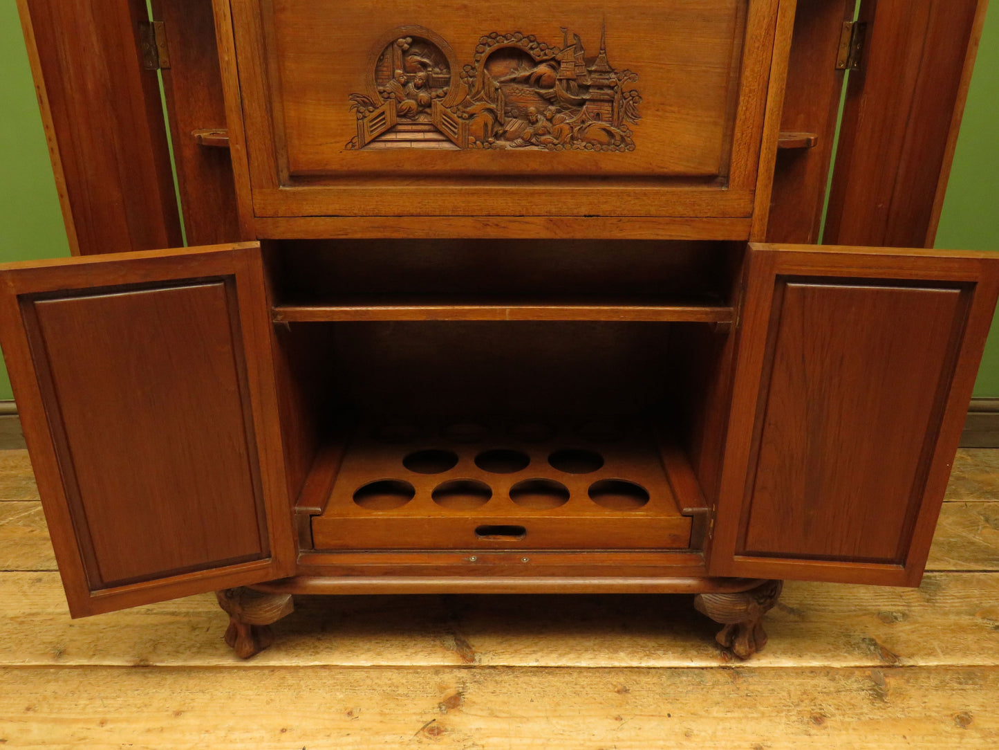 Oriental Hardwood Cocktail Cabinet with Bow Front & Carvings