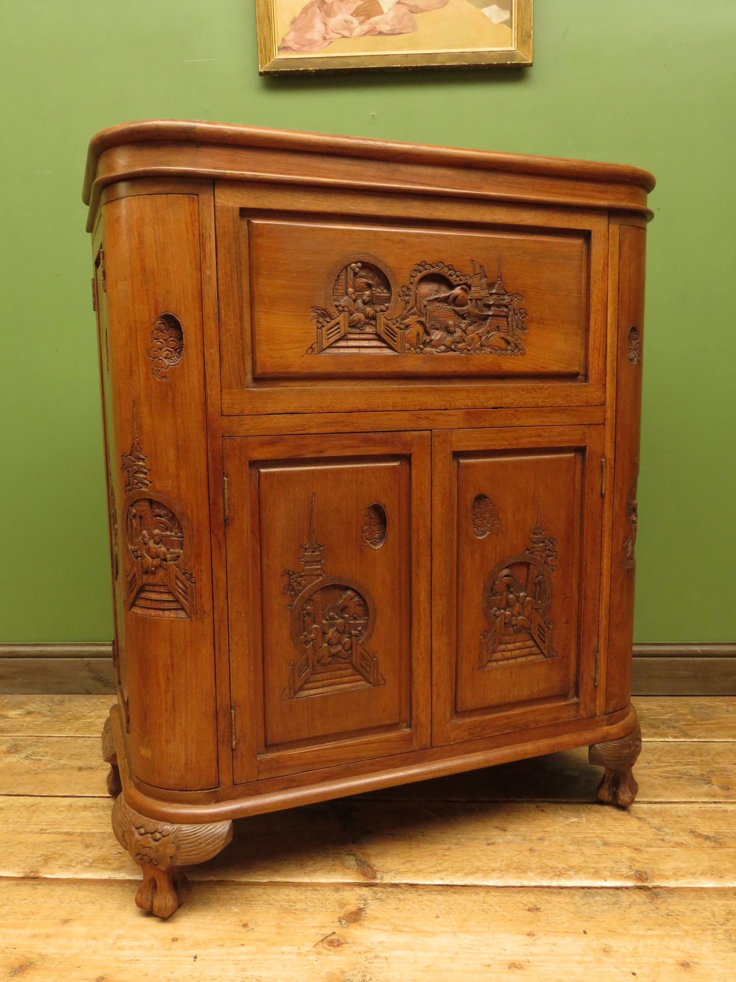 Oriental Hardwood Cocktail Cabinet with Bow Front & Carvings