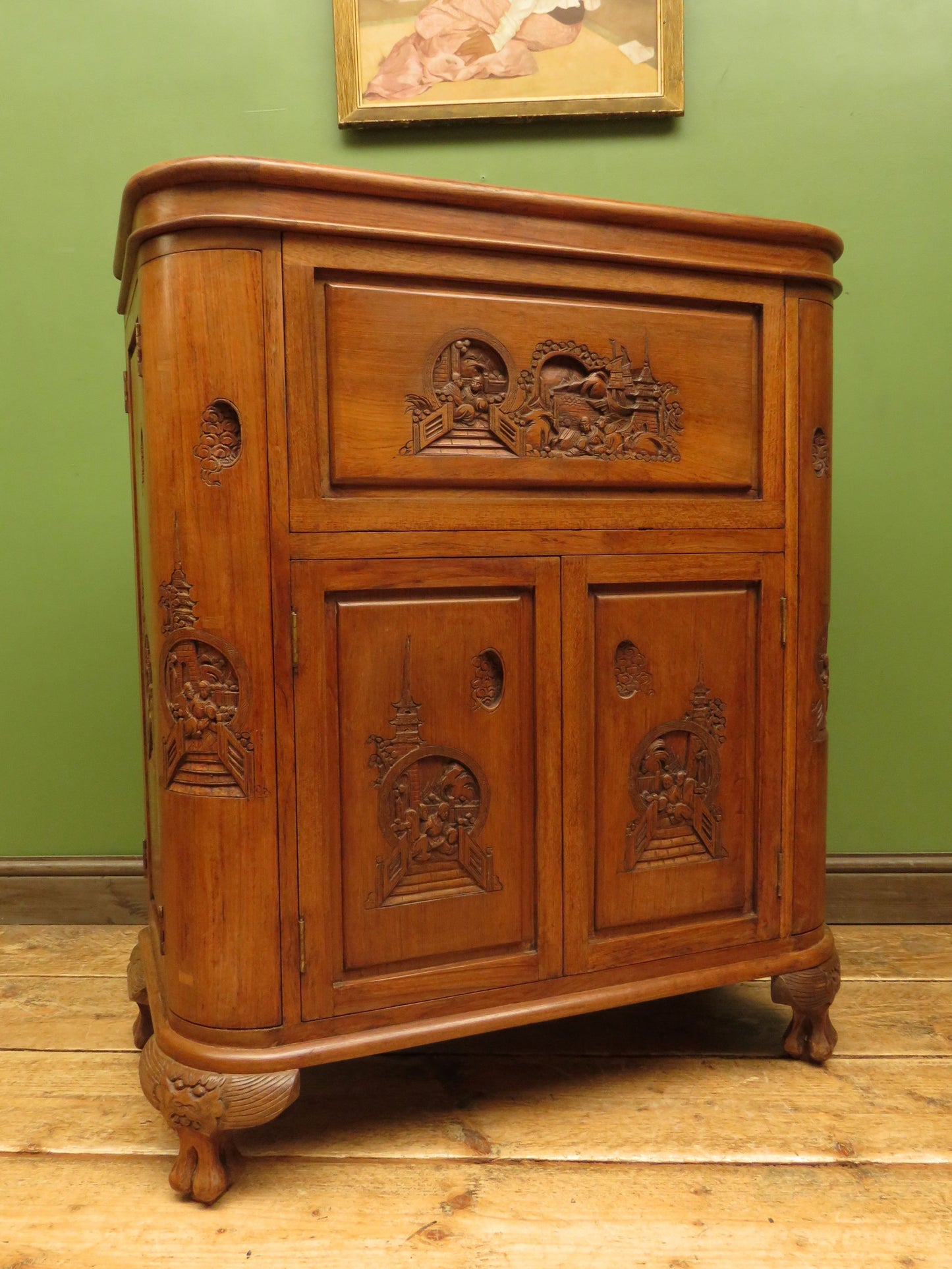 Oriental Hardwood Cocktail Cabinet with Bow Front & Carvings