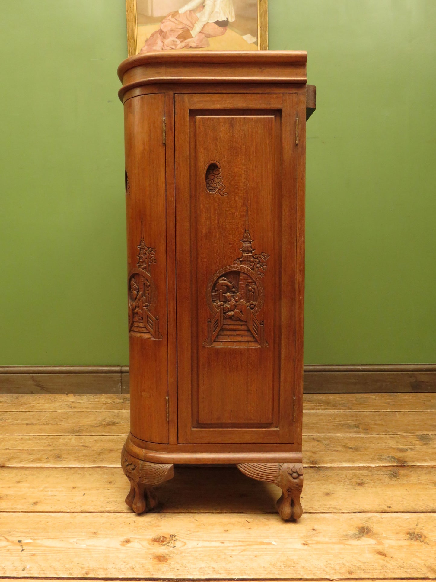 Oriental Hardwood Cocktail Cabinet with Bow Front & Carvings