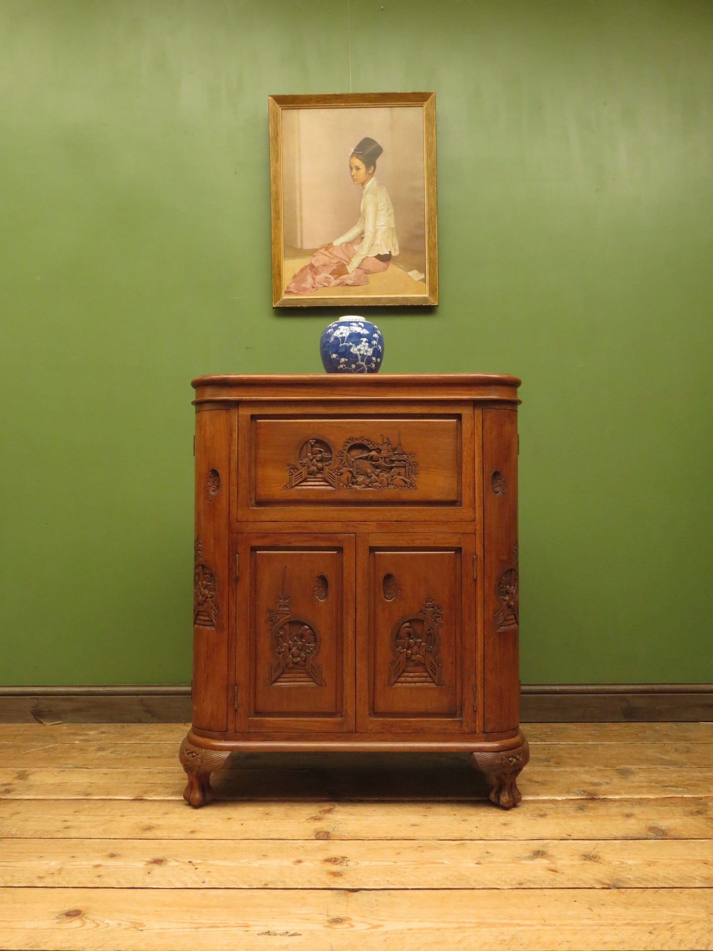 Oriental Hardwood Cocktail Cabinet with Bow Front & Carvings