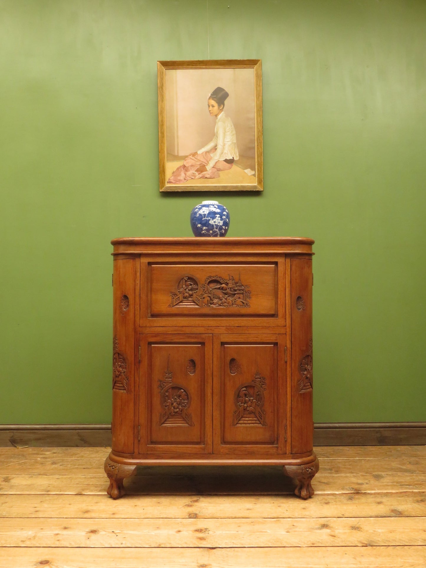 Oriental Hardwood Cocktail Cabinet with Bow Front & Carvings