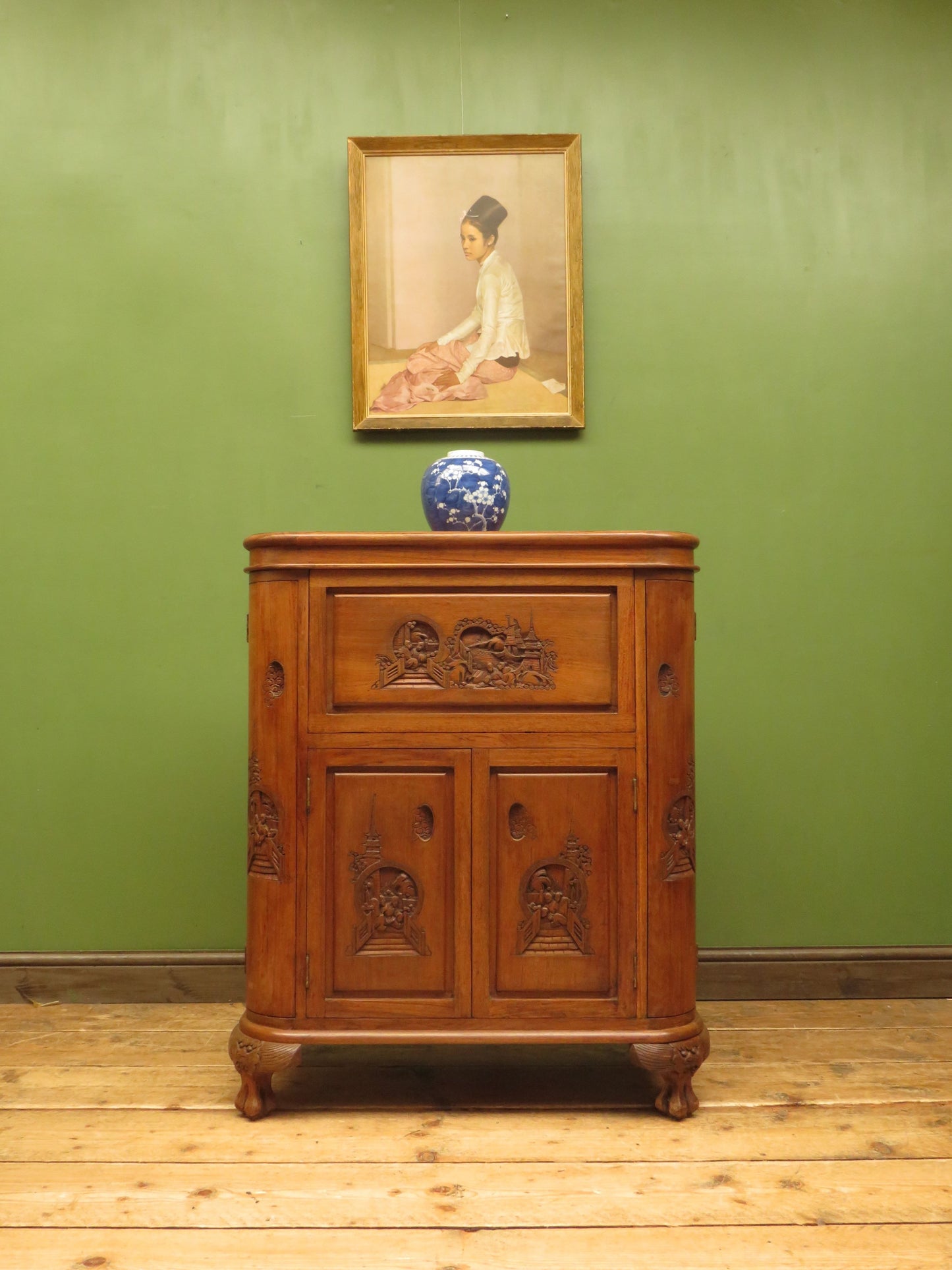 Oriental Hardwood Cocktail Cabinet with Bow Front & Carvings