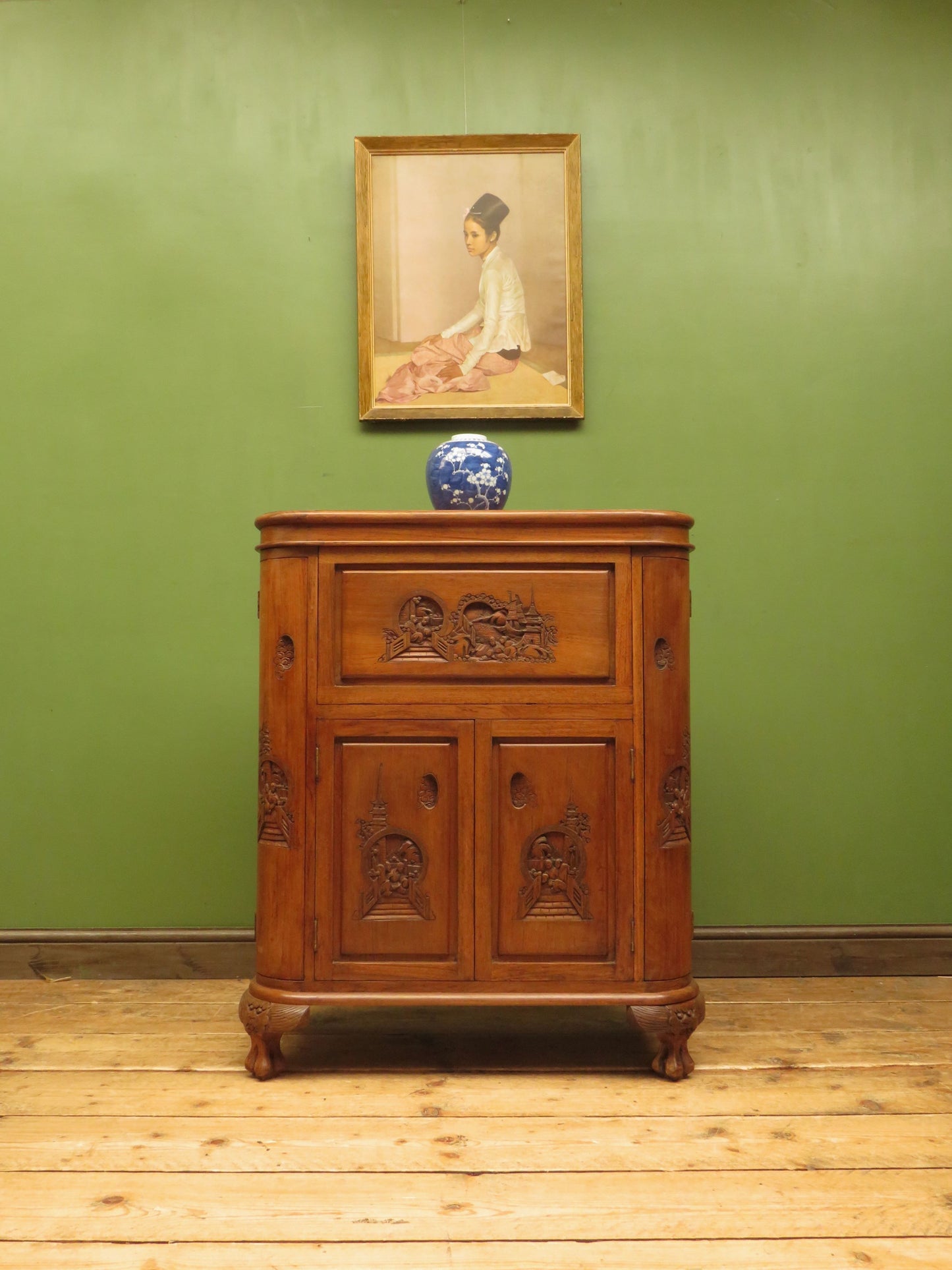 Oriental Hardwood Cocktail Cabinet with Bow Front & Carvings