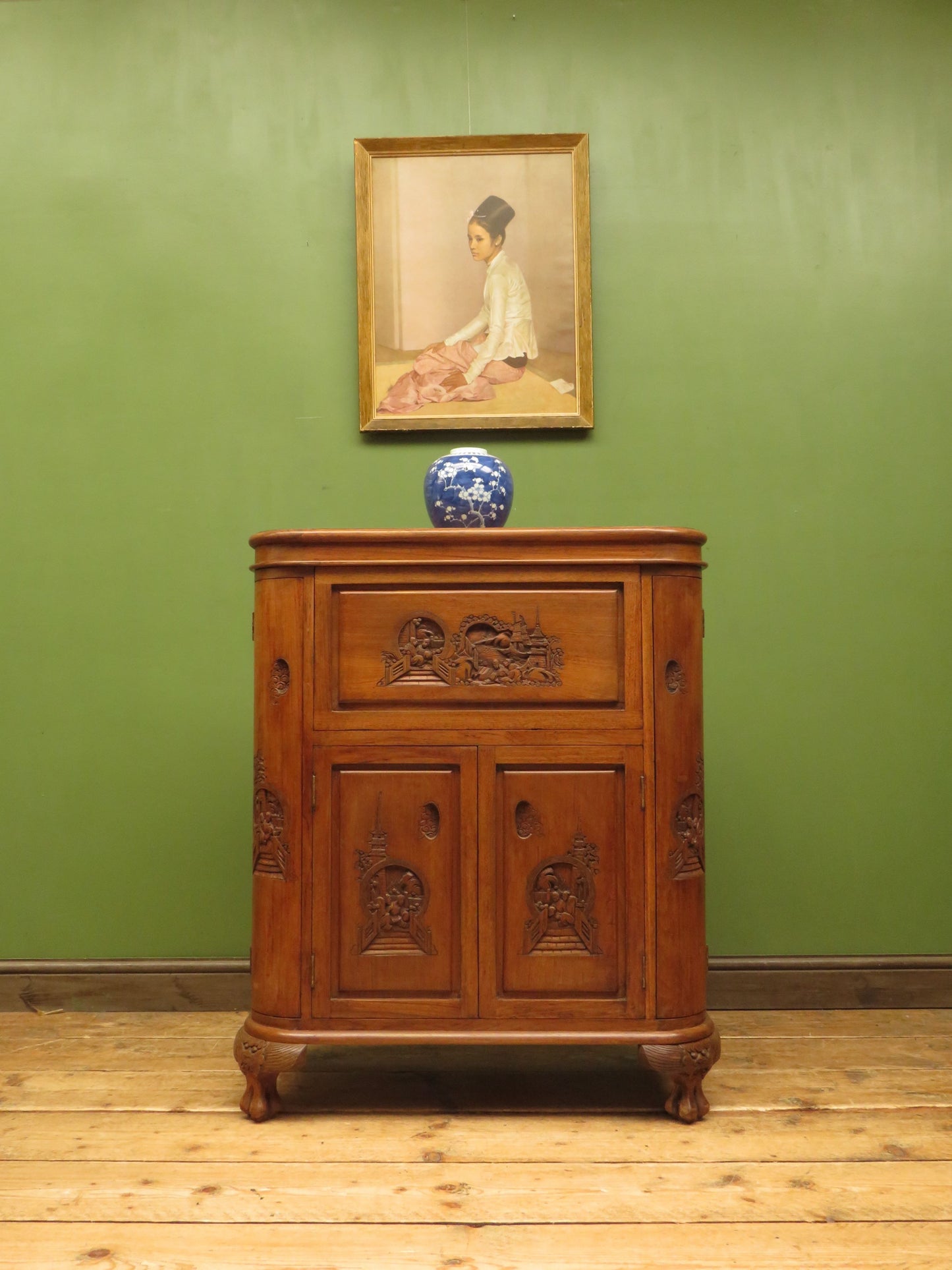 Oriental Hardwood Cocktail Cabinet with Bow Front & Carvings