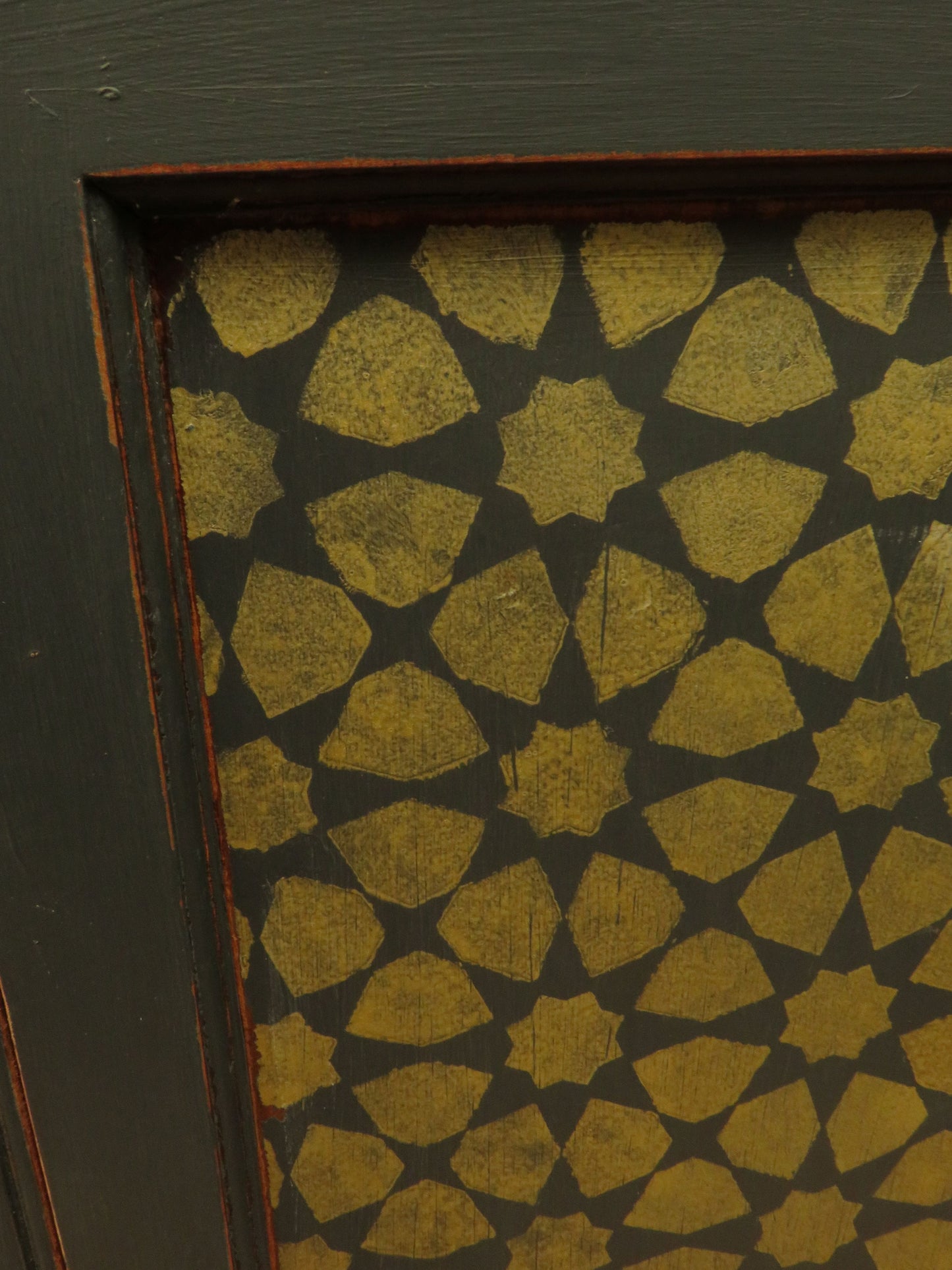 Narrow Black Cupboard with Geometric patterned door