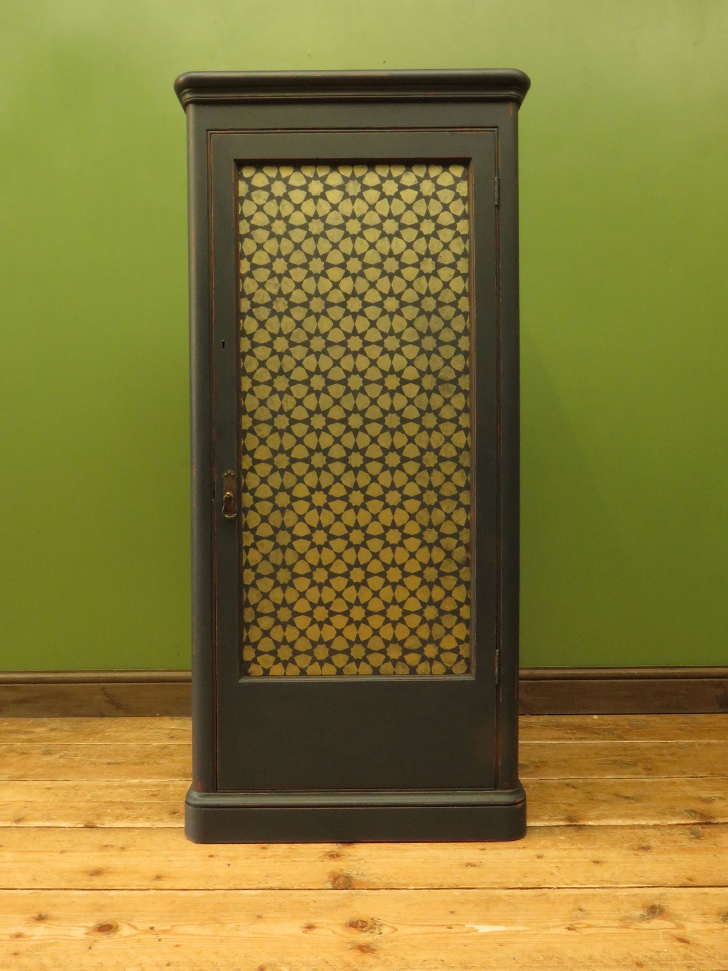 Narrow Black Cupboard with Geometric patterned door