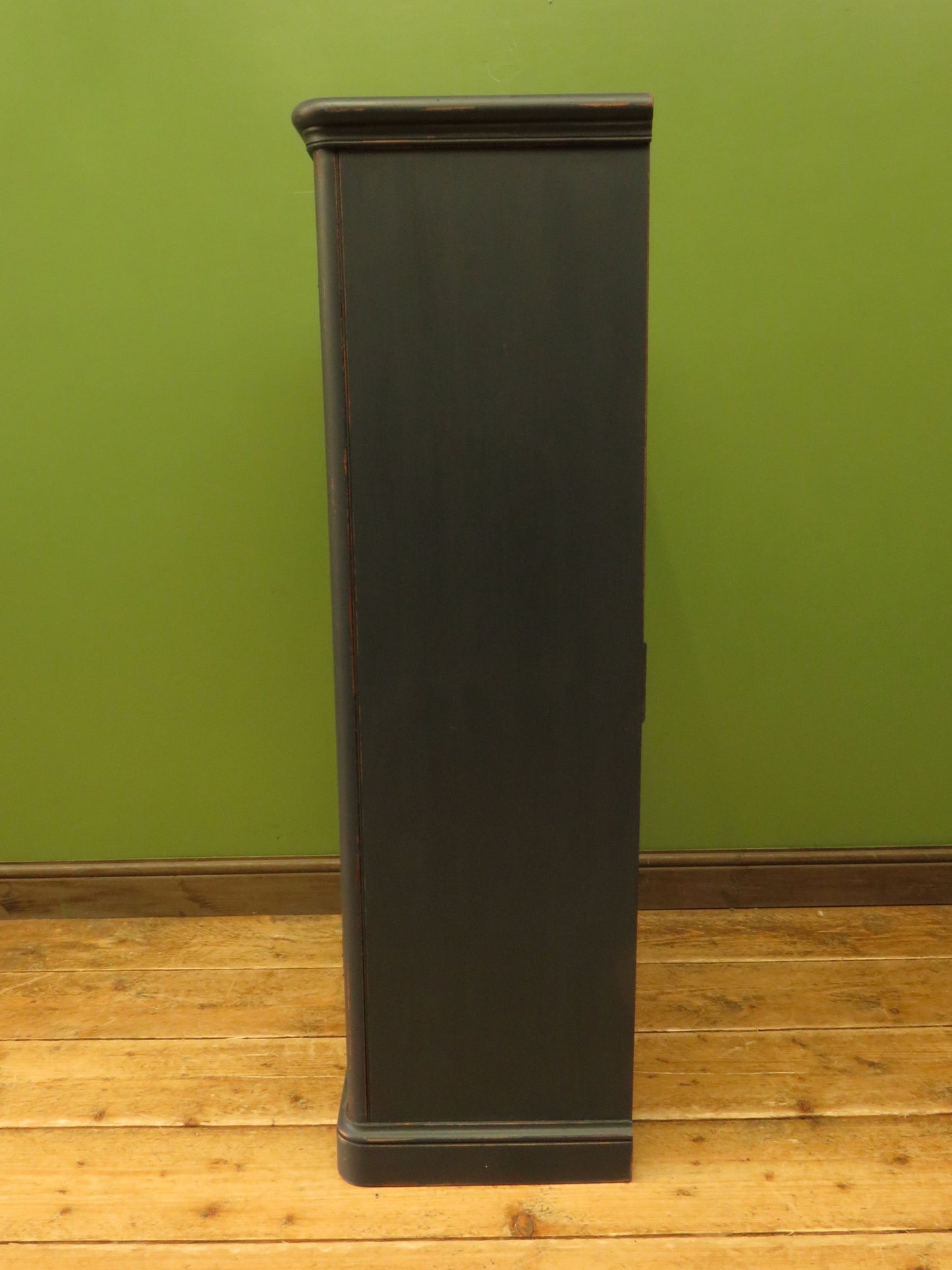 Narrow Black Cupboard with Geometric patterned door
