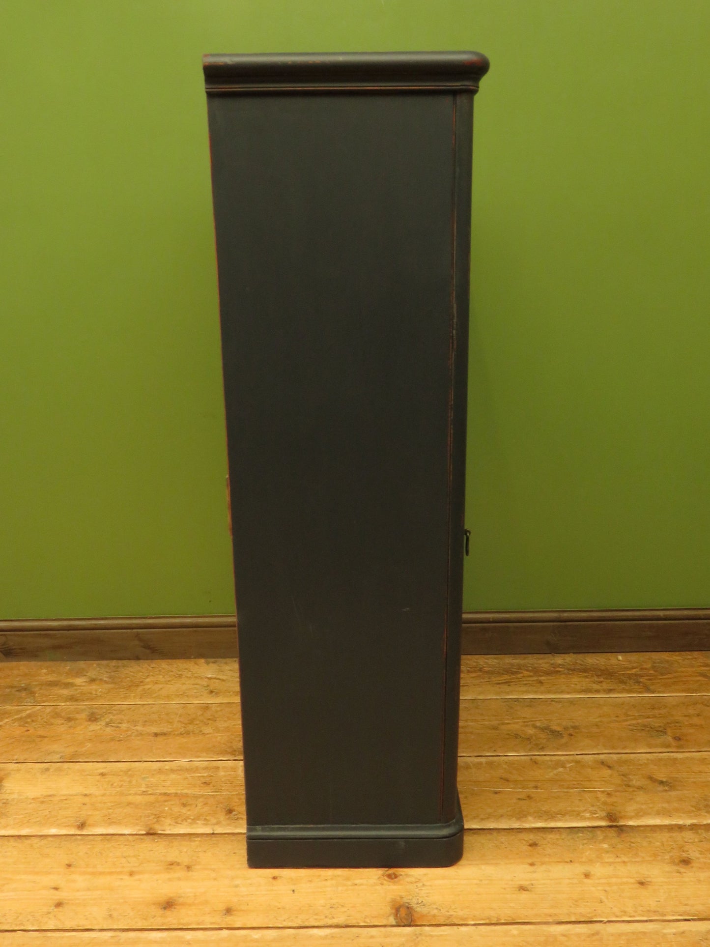 Narrow Black Cupboard with Geometric patterned door