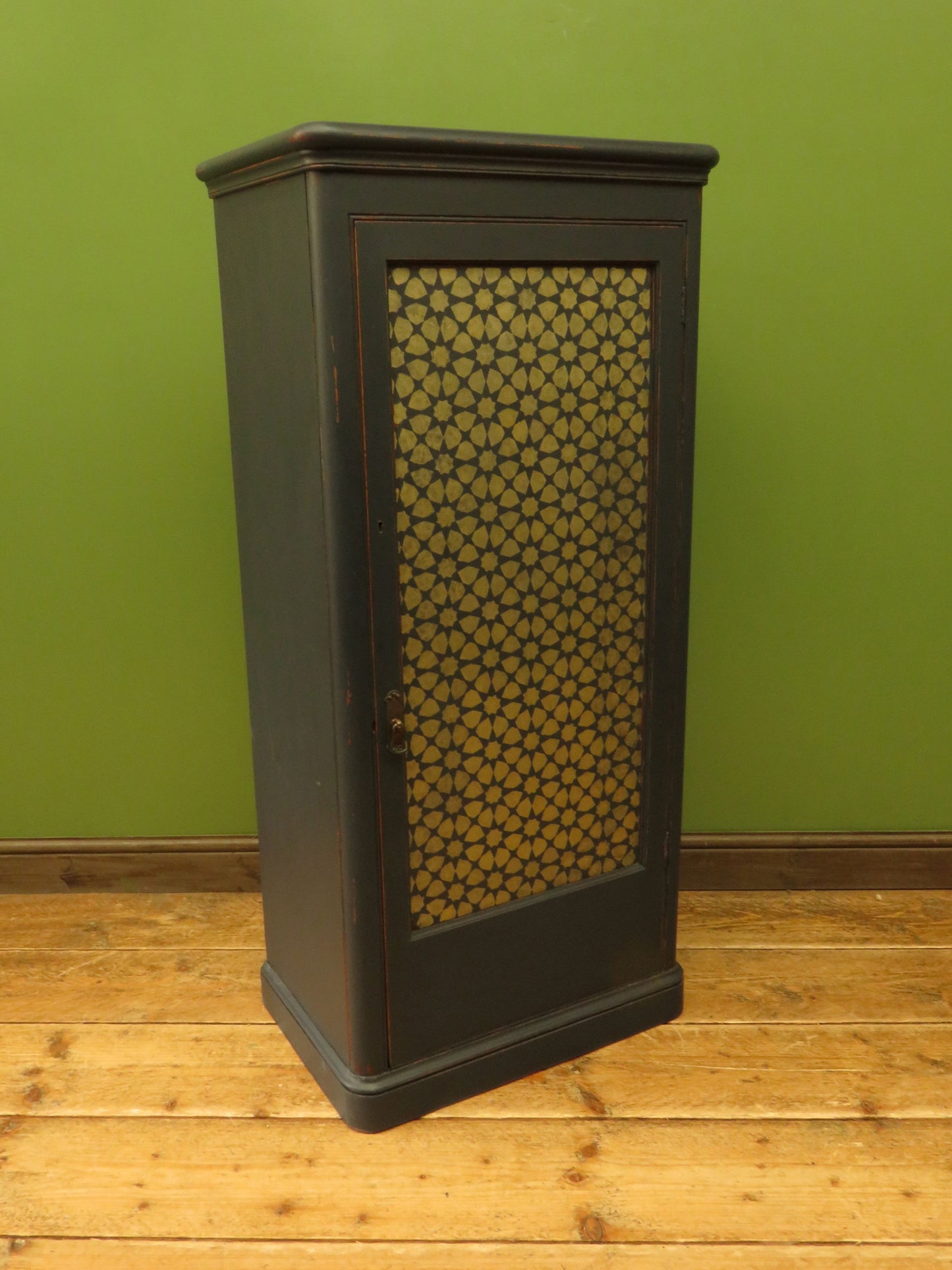 Narrow Black Cupboard with Geometric patterned door