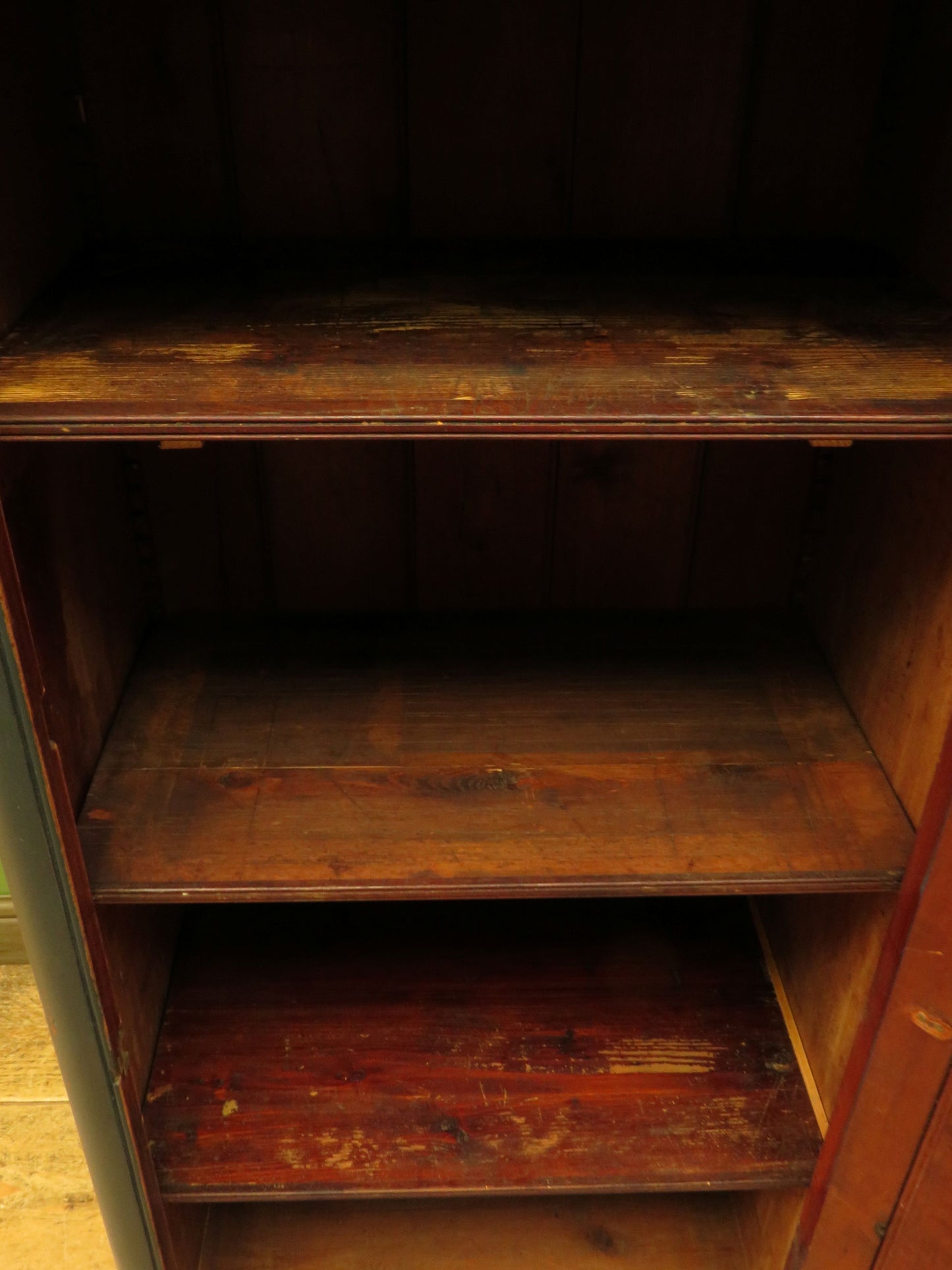 Narrow Black Cupboard with Geometric patterned door