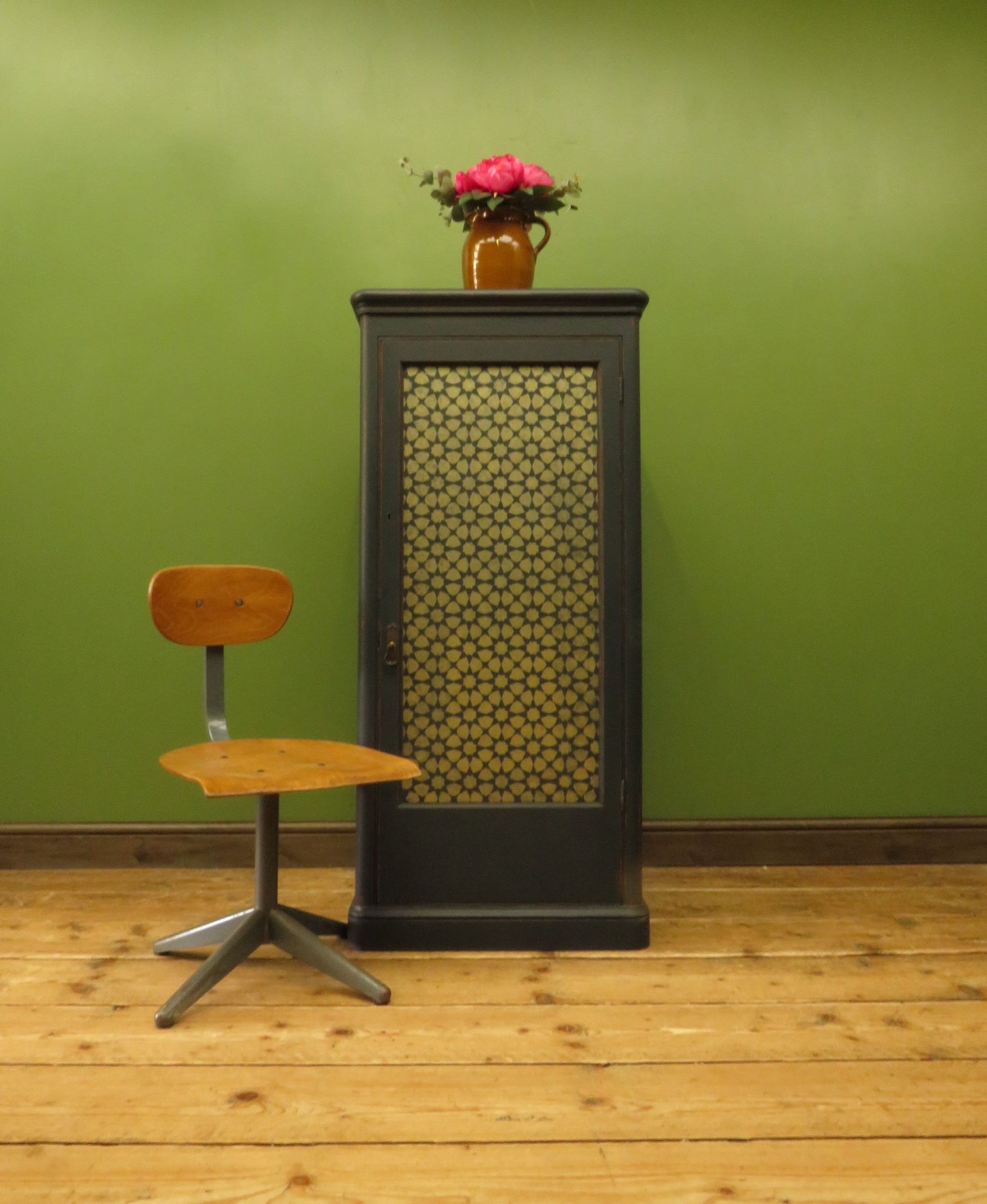 Narrow Black Cupboard with Geometric patterned door