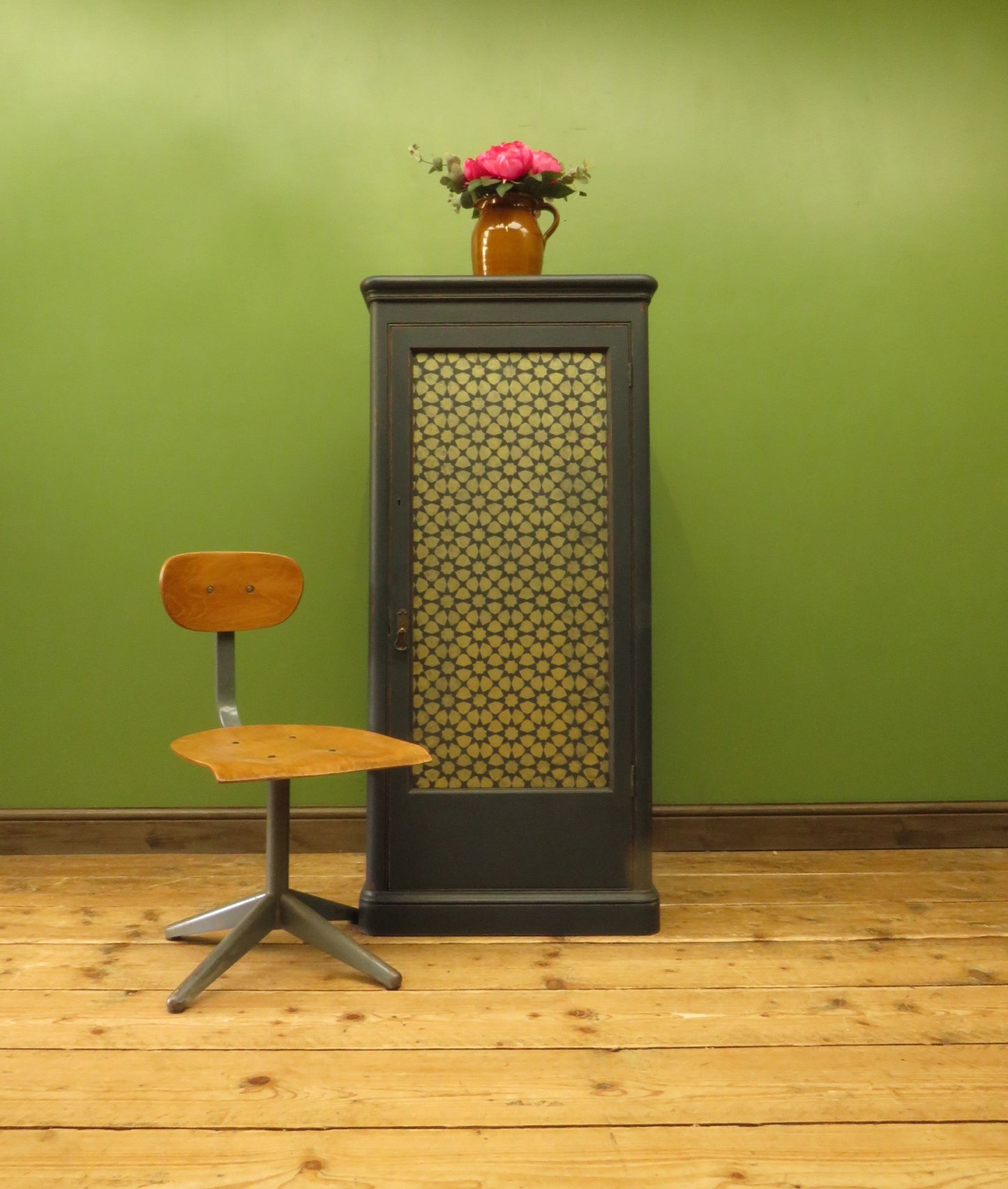Narrow Black Cupboard with Geometric patterned door